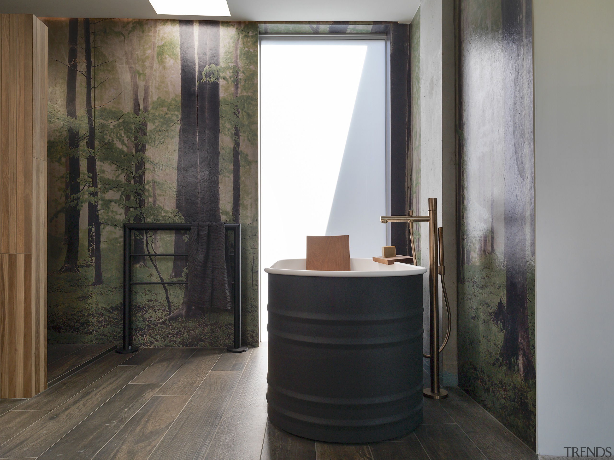 Dark, richly textured timber-look porcelain flooring contrasts elegantly 