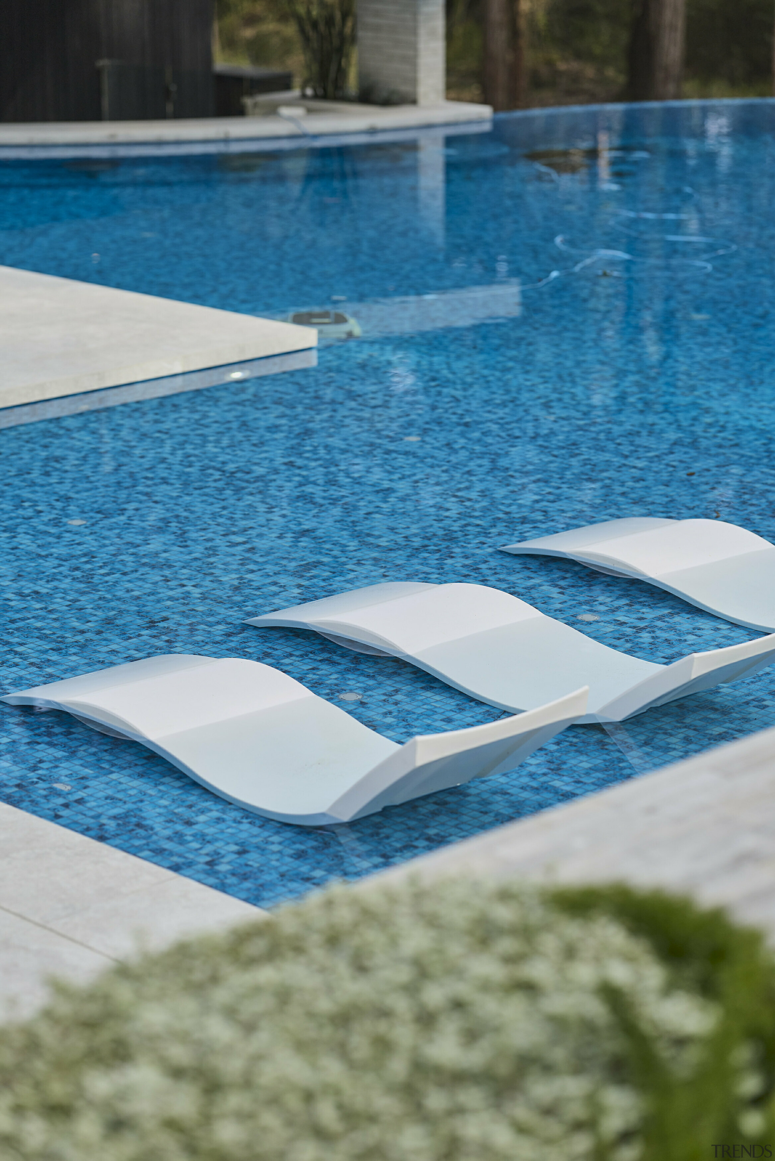 Deepdive pool tiles introduce a mottled surface quality 