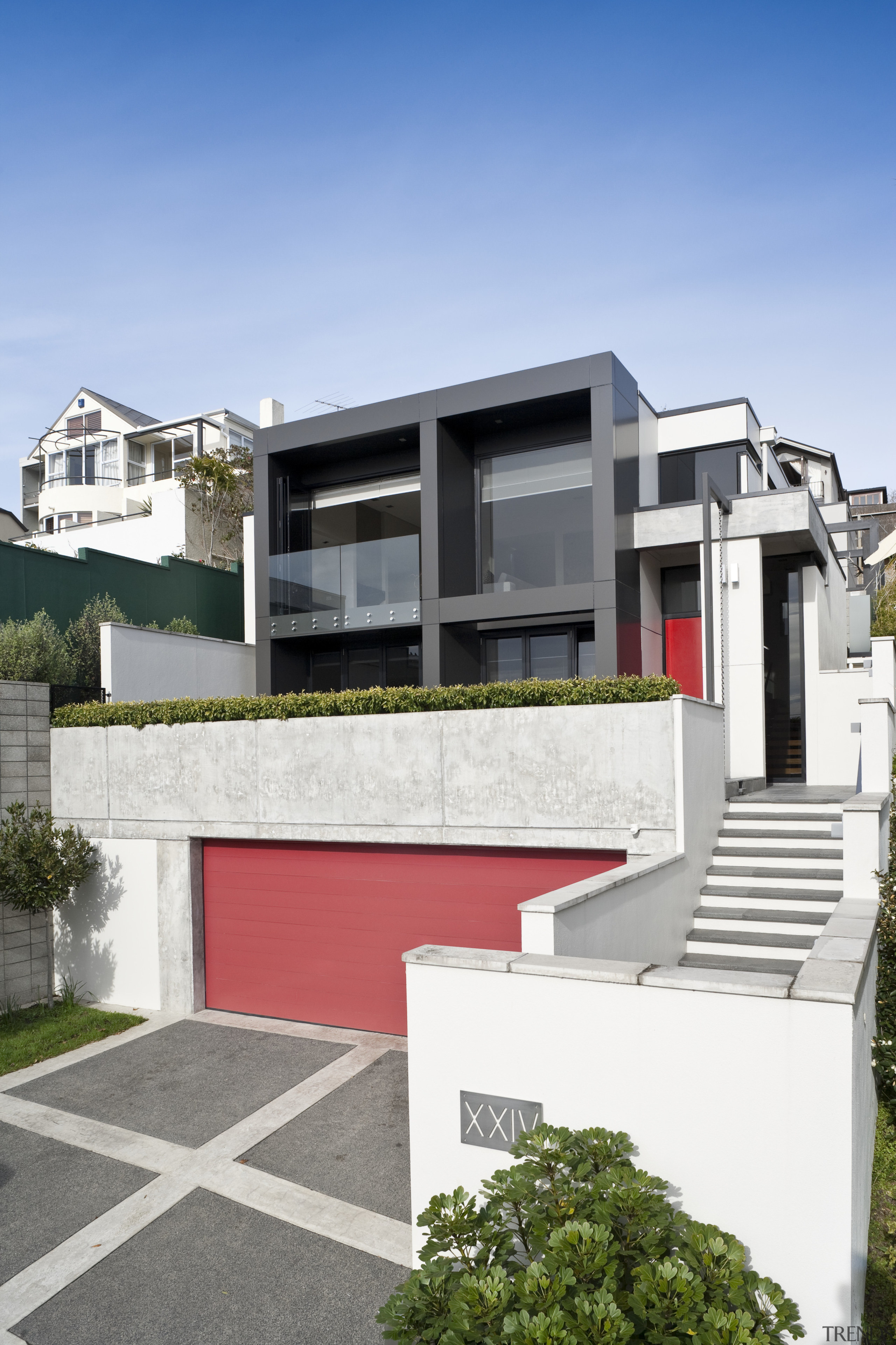 View of the exterior featuring aluminum cladding. - architecture, building, elevation, facade, home, house, neighbourhood, property, real estate, residential area, suburb, teal, white