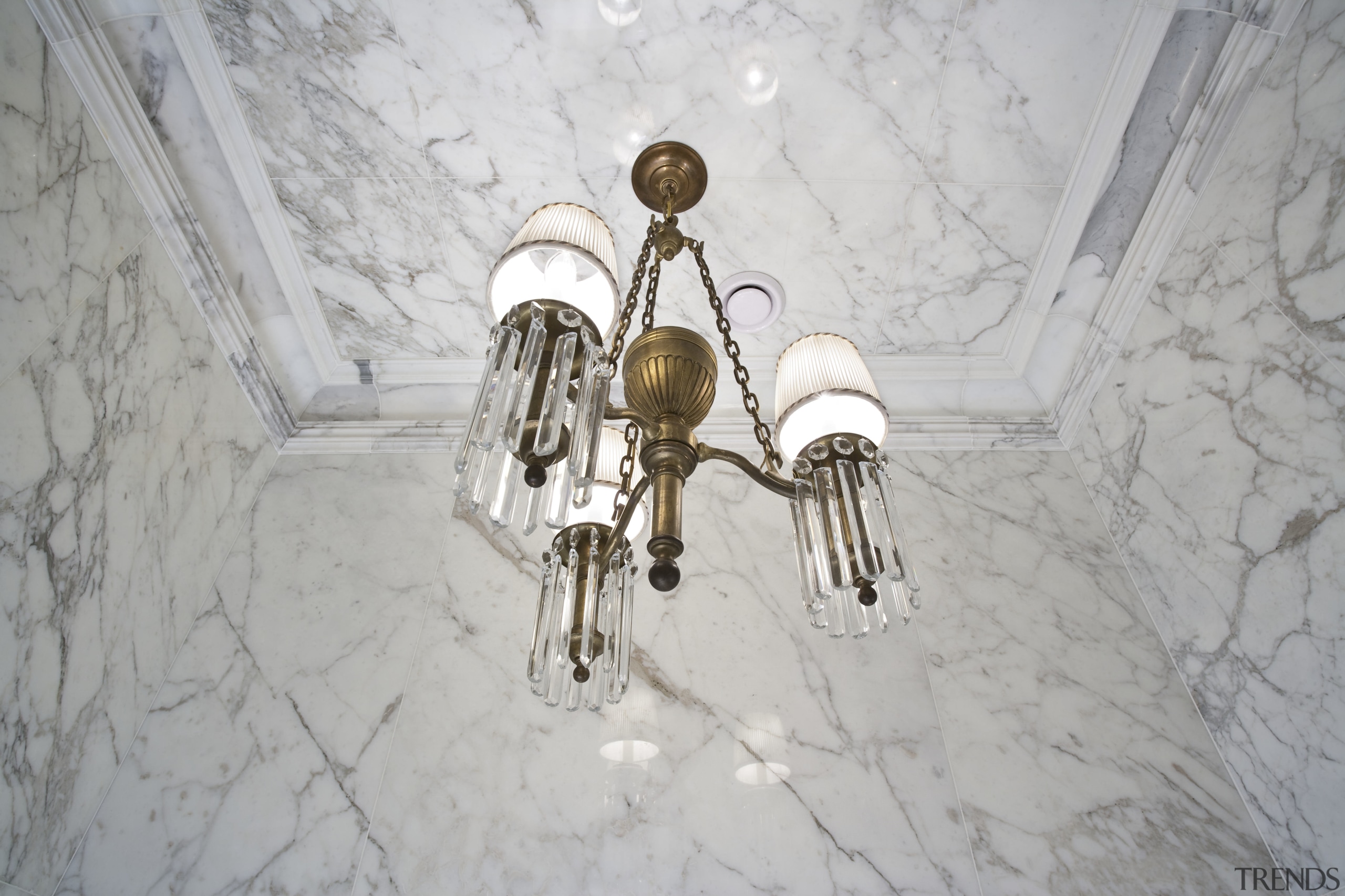 Interior view of this unique bathroom features a light fixture, lighting, snow, winter, gray