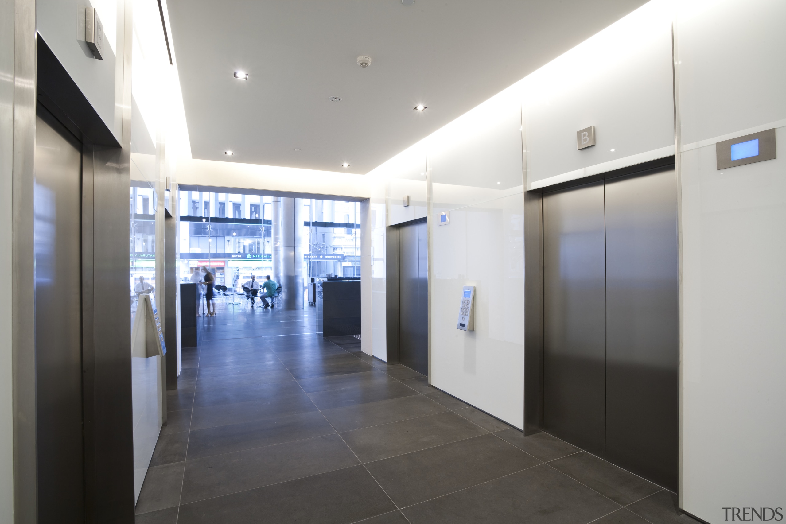 View of the elevators at the new Deloitte ceiling, door, floor, interior design, lobby, property, real estate, white, gray