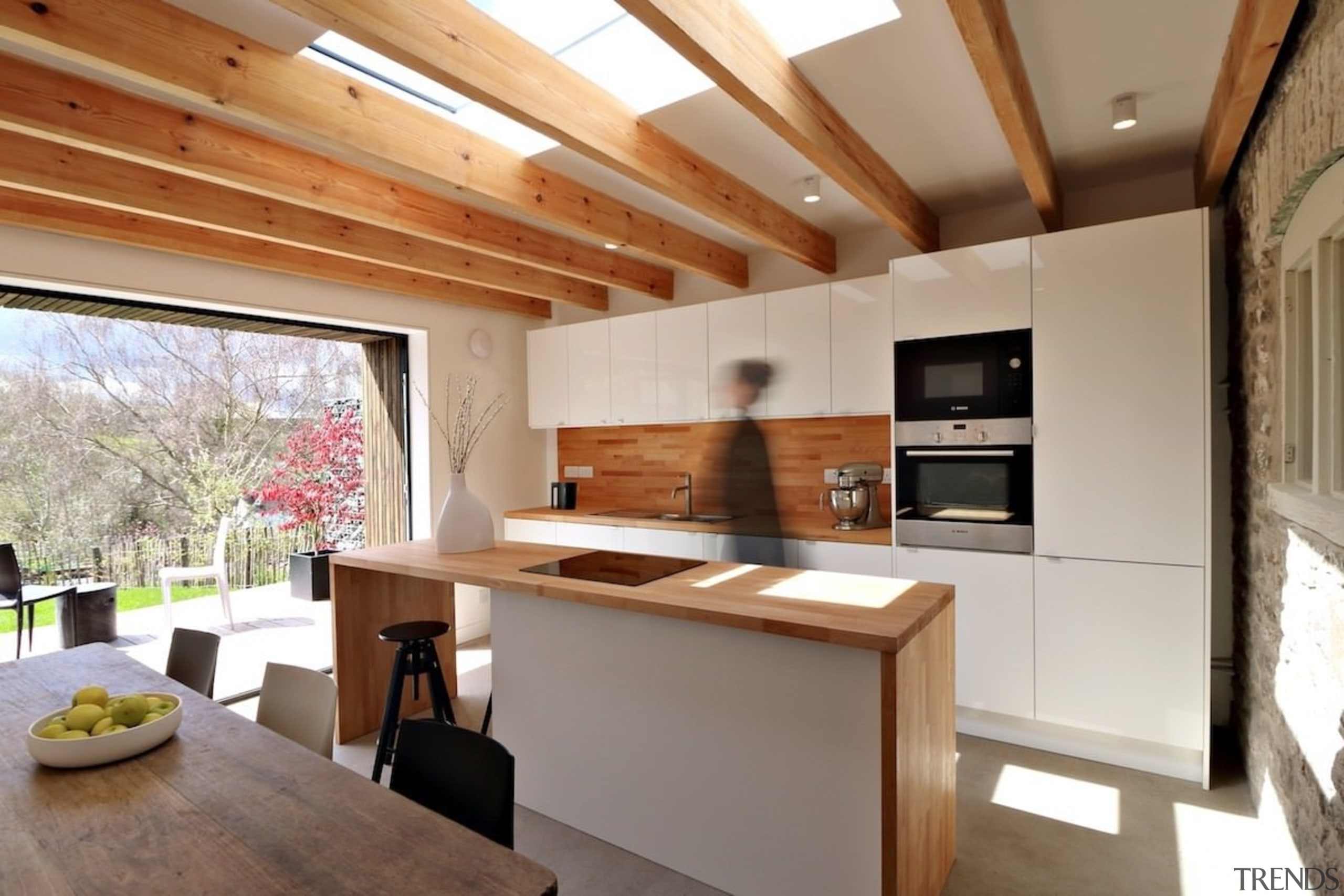 The main living area opens out to the architecture, ceiling, countertop, cuisine classique, house, interior design, kitchen, real estate, gray, brown
