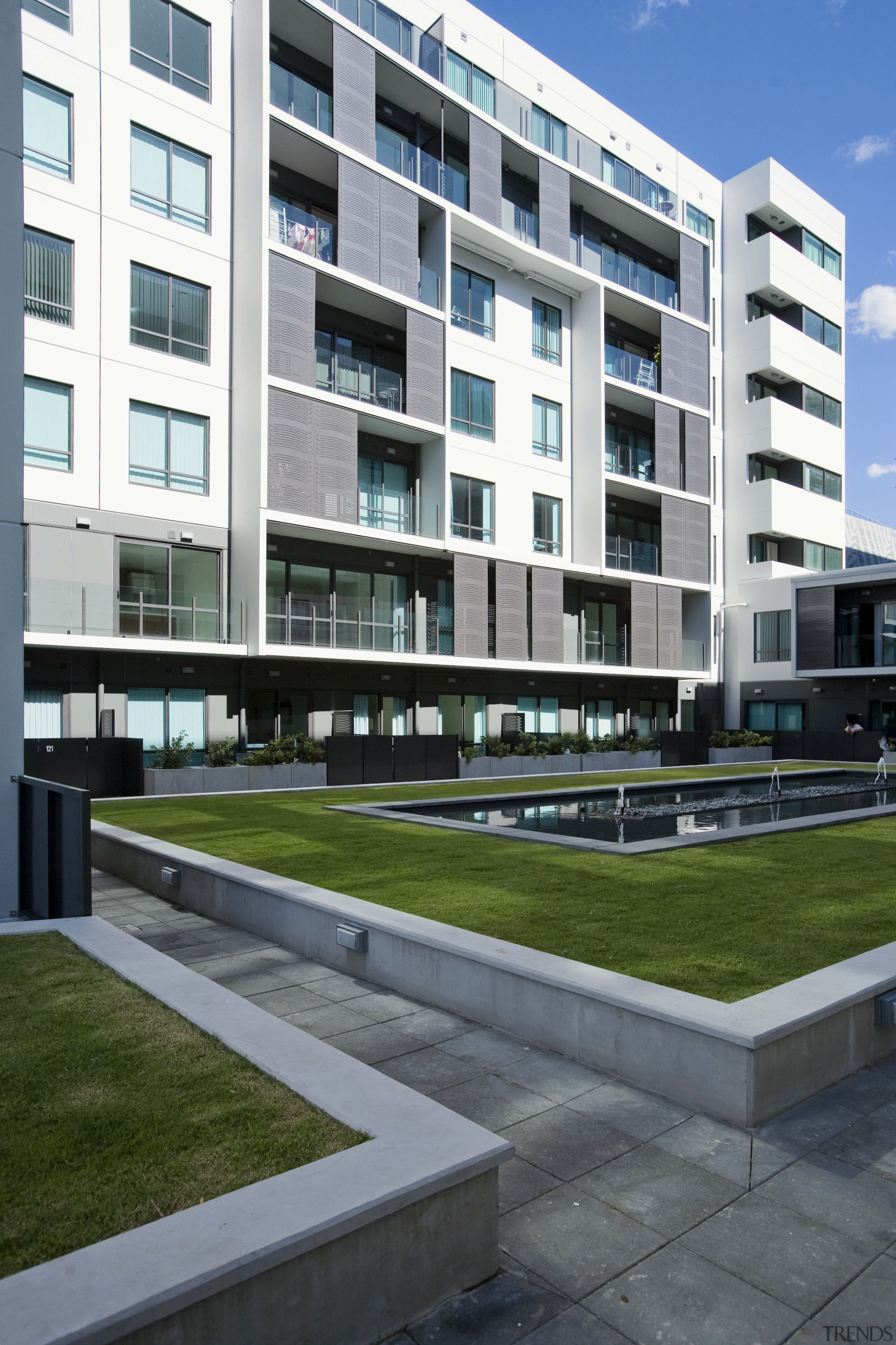 The Docks consists of four seperate apartments towers, apartment, architecture, building, commercial building, condominium, corporate headquarters, daytime, estate, facade, headquarters, house, metropolitan area, mixed use, neighbourhood, real estate, residential area, sky, suburb, tower block, urban design, gray