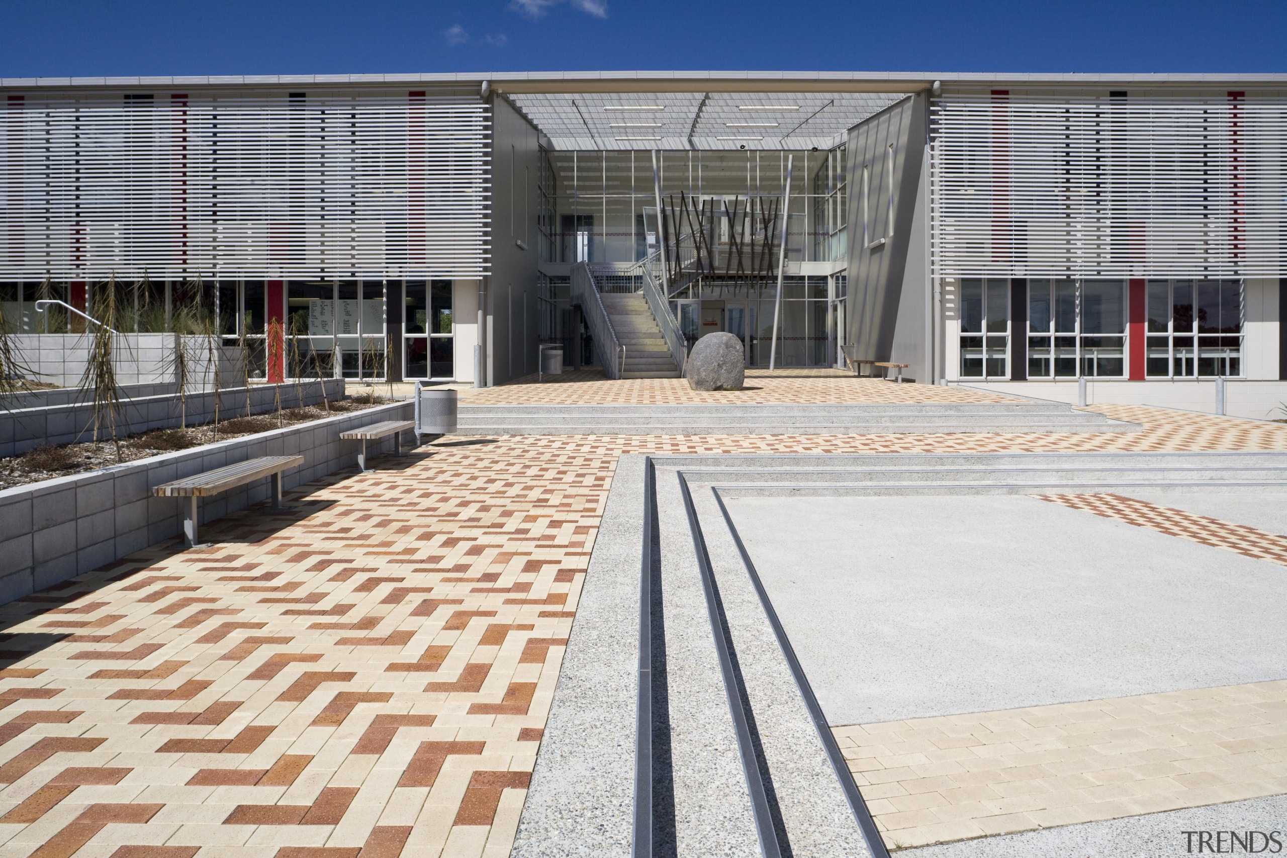 Image of Te Whanau o tupuranga school which architecture, building, facade, floor, real estate, road surface, structure, white