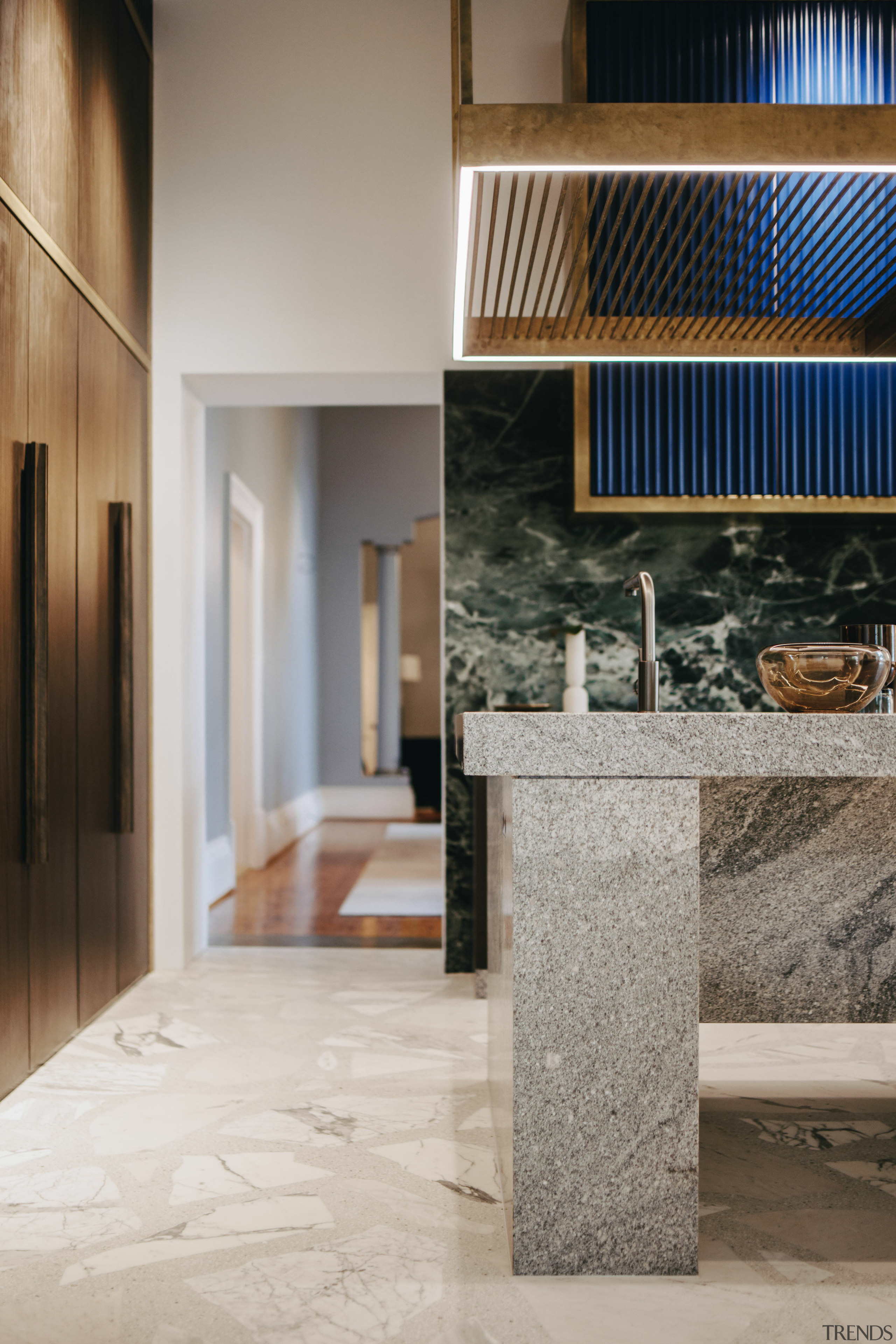 Detail shot showcasing the island bench, custom cabinetry, 