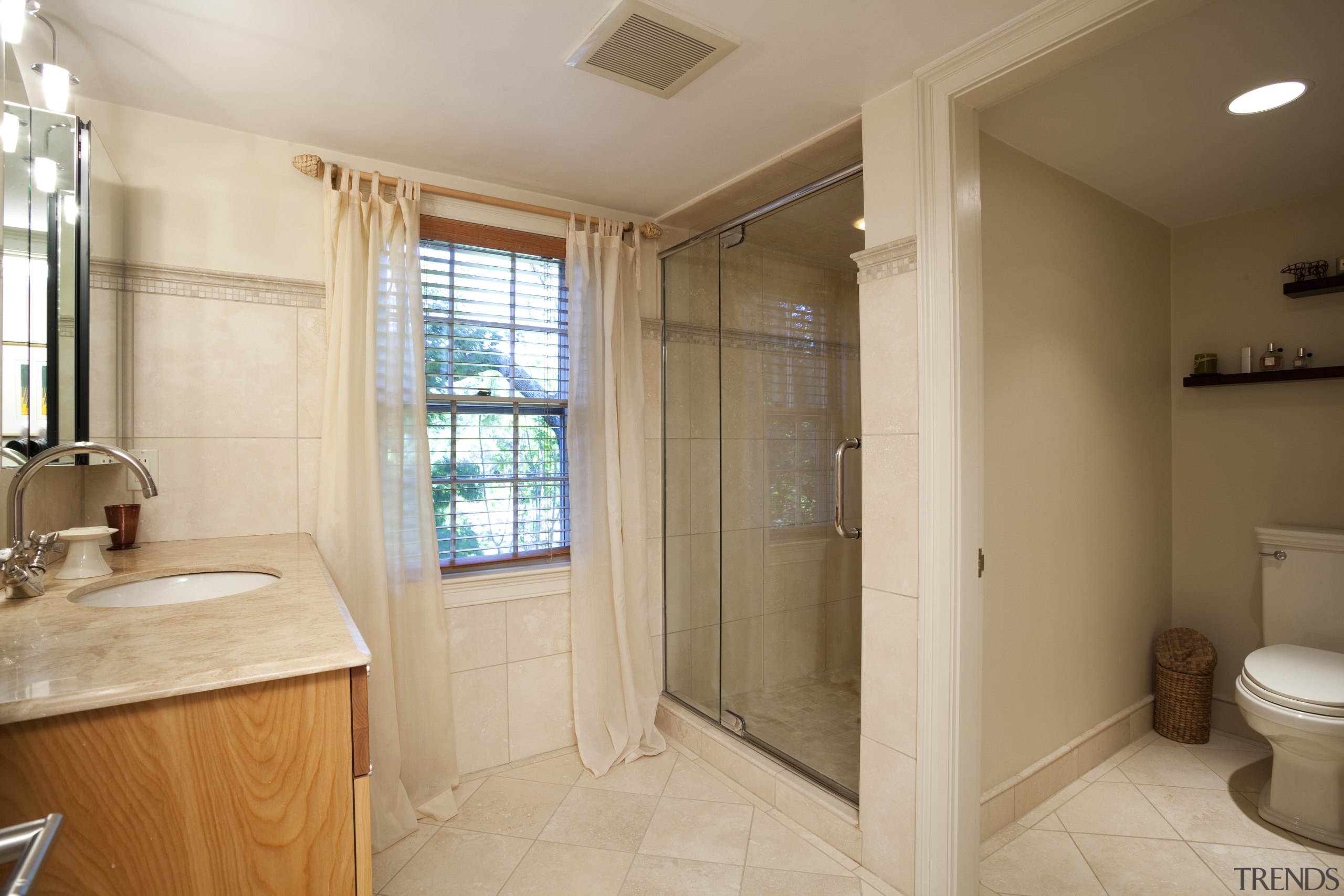 A toilet cubicle was added to the bathroom bathroom, estate, floor, flooring, home, interior design, property, real estate, room, window, orange, brown