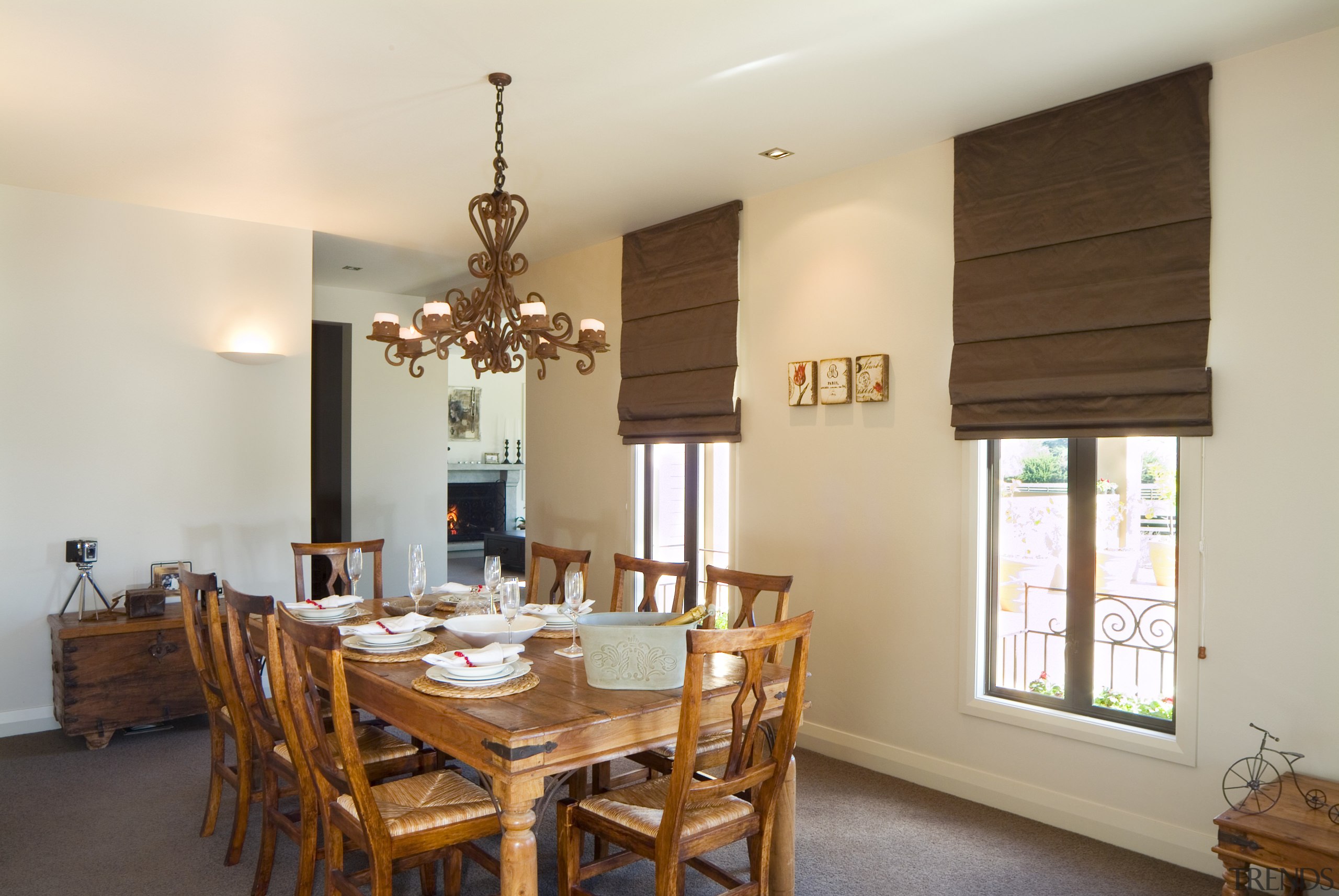 Wrought iron accents, such as the dining room ceiling, dining room, home, interior design, property, real estate, room, table, gray, brown