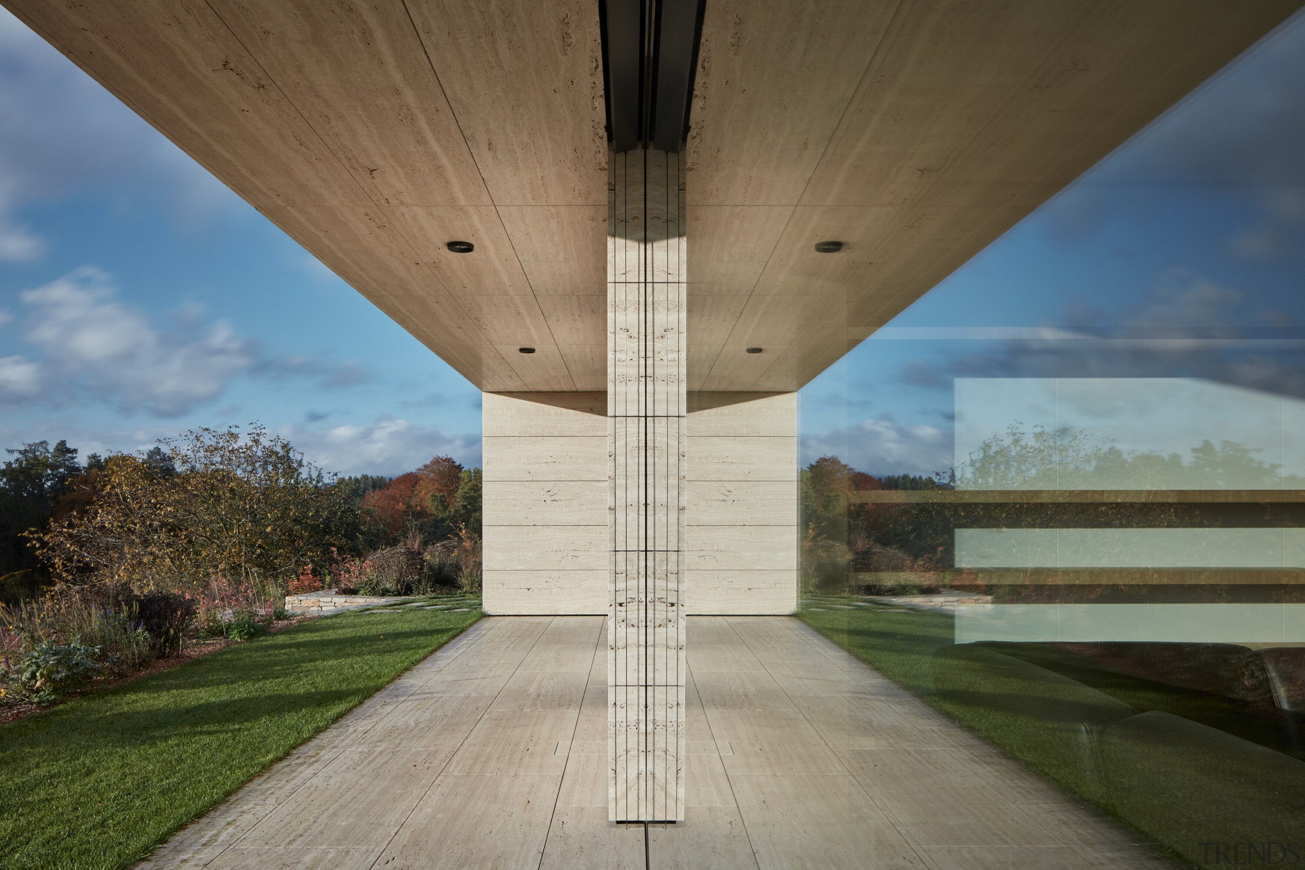 Concrete and glass feature large in this indoor-outdoor 