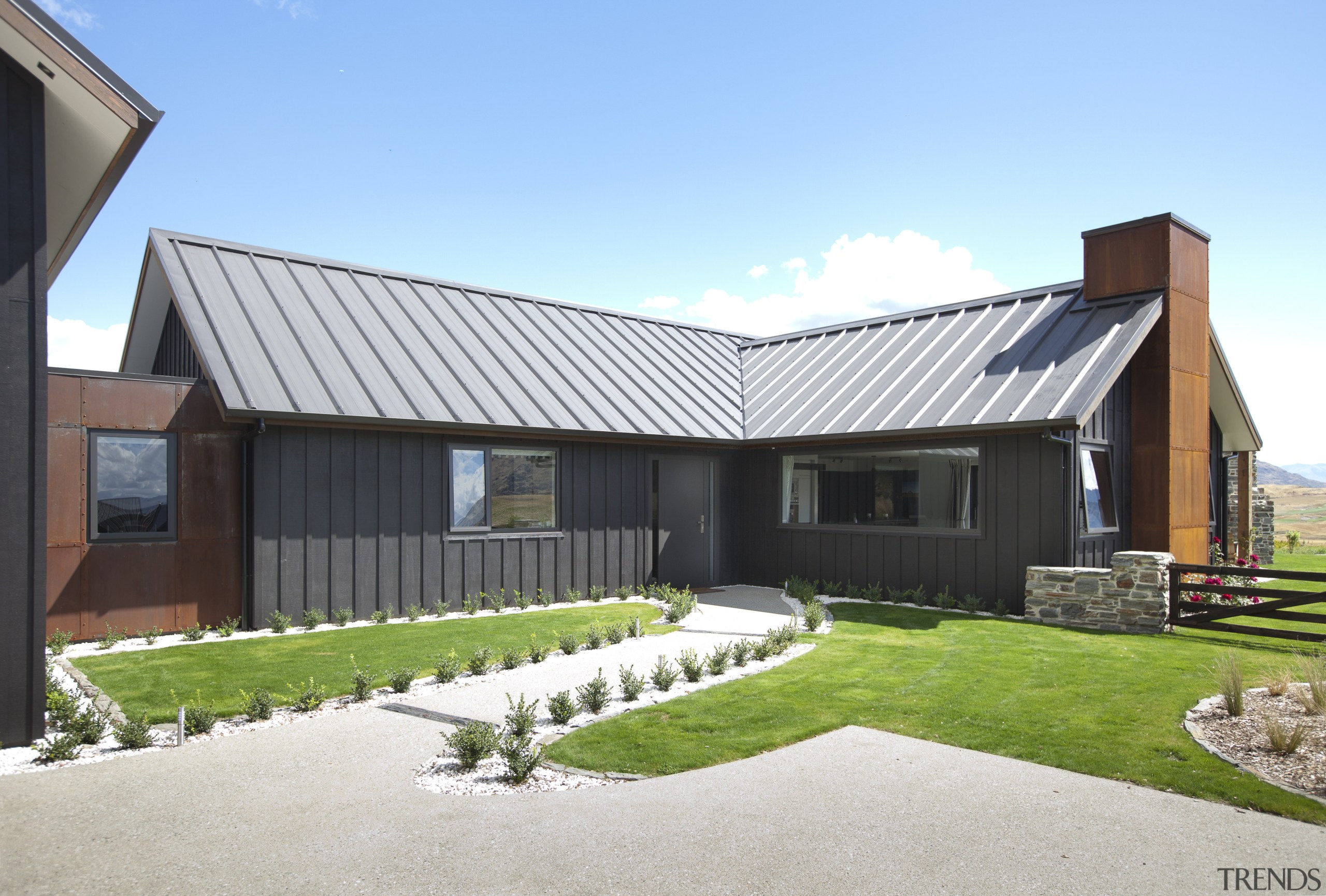 Exterior view of house with grey walls, small architecture, cottage, elevation, facade, farmhouse, home, house, property, real estate, residential area, roof, siding, window, white