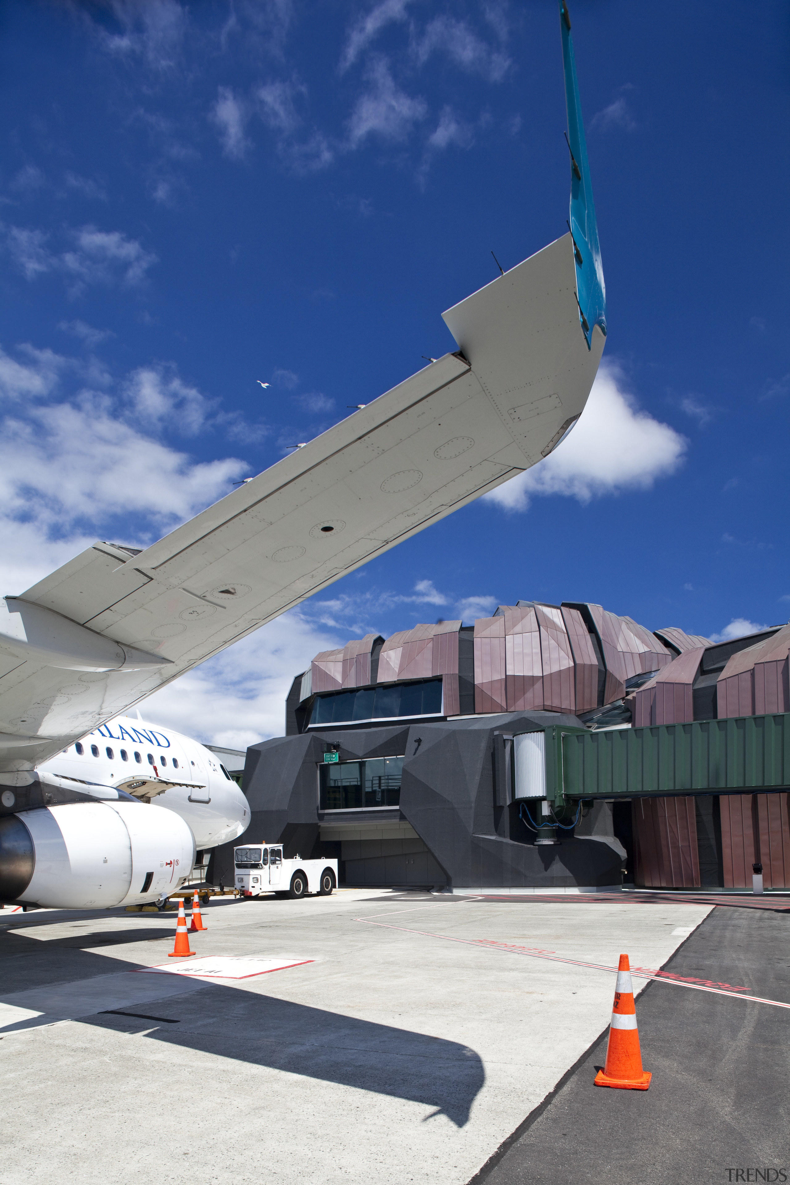 View of the new Wellington International Airport the aerospace engineering, air travel, aircraft, airline, airliner, airplane, architecture, atmosphere of earth, aviation, flap, narrow body aircraft, sky, wide body aircraft, blue