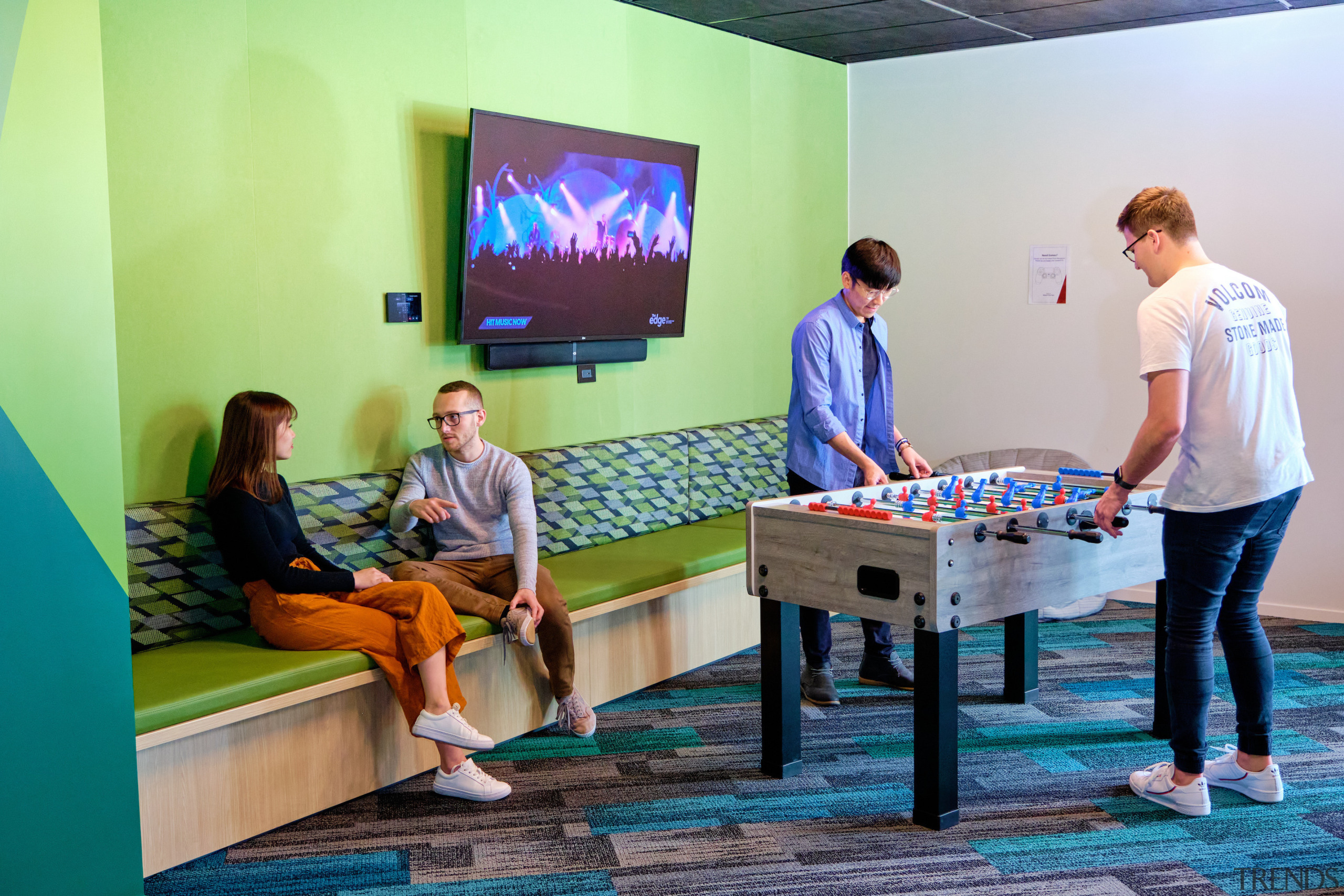 Colourful banquette seating and colourful carpet &nbsp;contribute to 