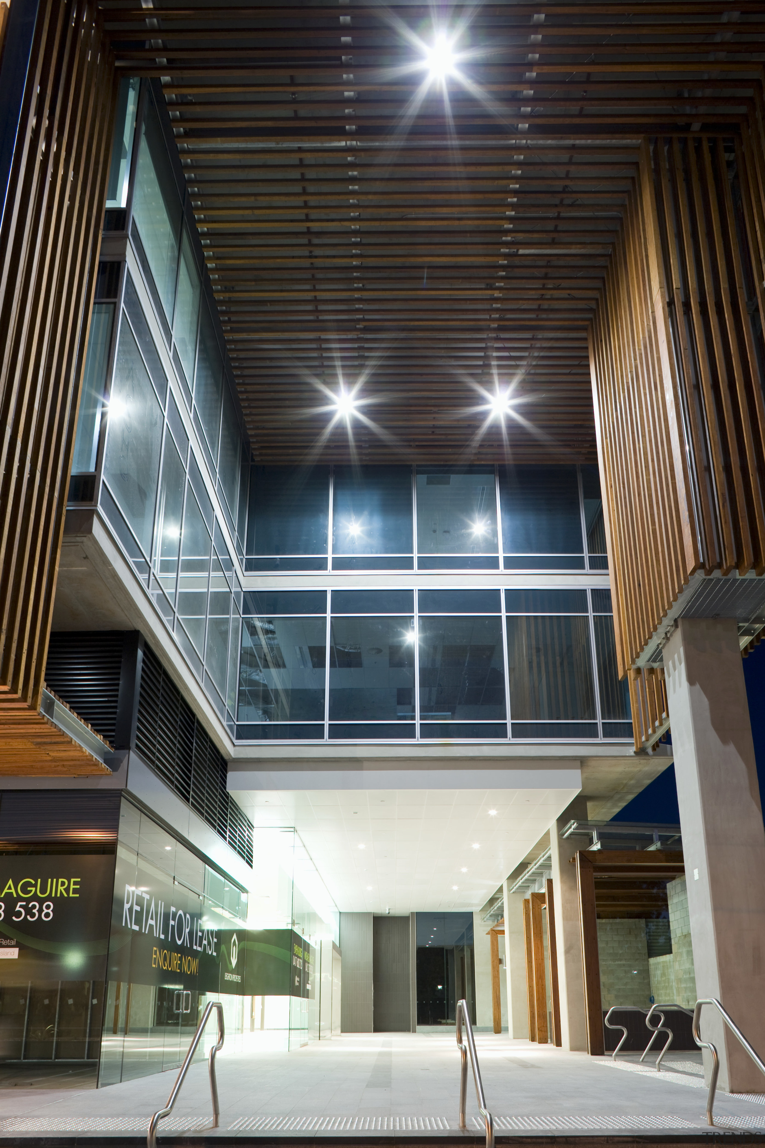 The entrance to Green Square North Tower and apartment, architecture, building, ceiling, condominium, daylighting, facade, home, house, interior design, lobby, window, black