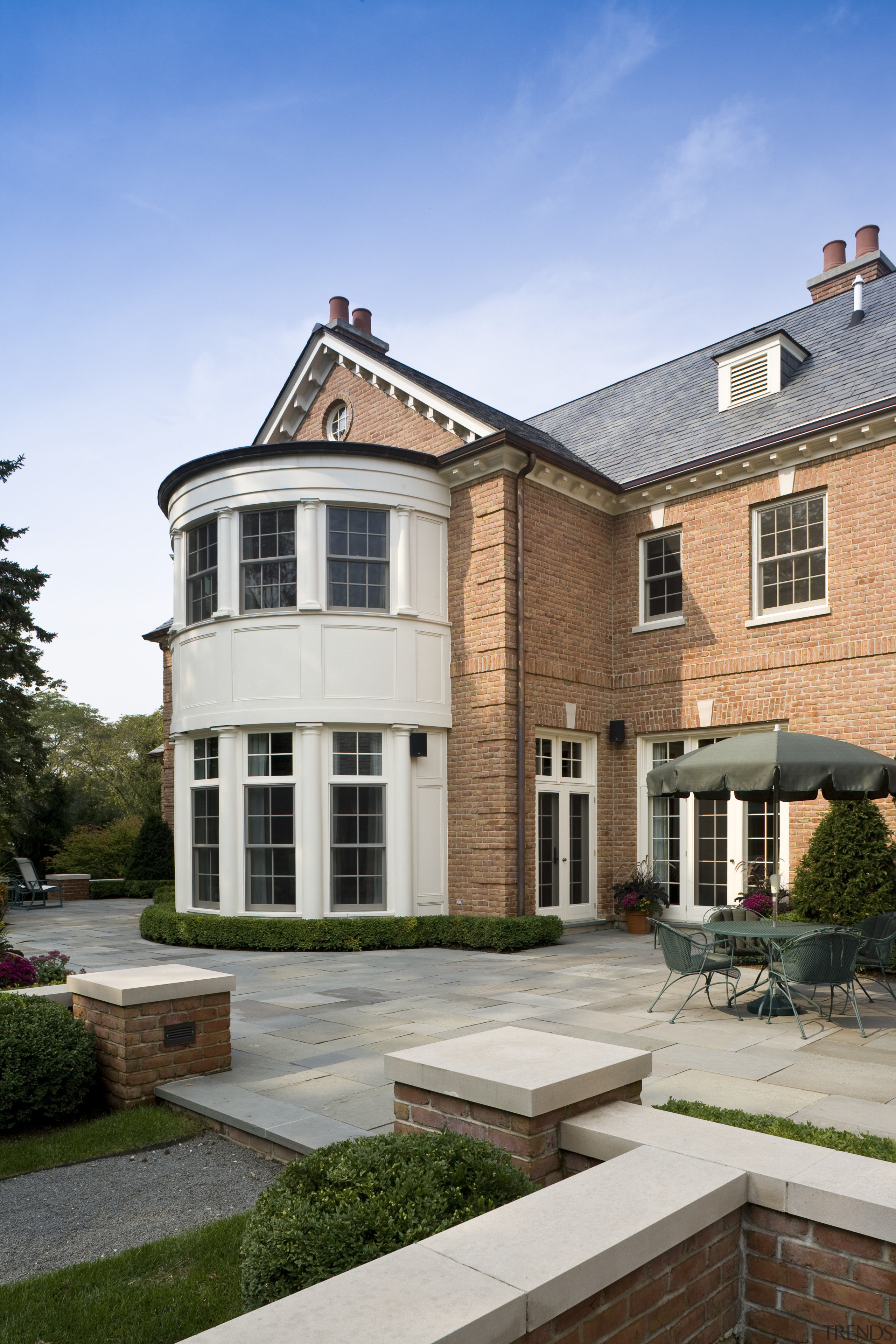 Exterior view of Georgian-style home with brick cladding, building, cottage, elevation, estate, facade, home, house, mansion, property, real estate, residential area, roof, suburb, window, gray