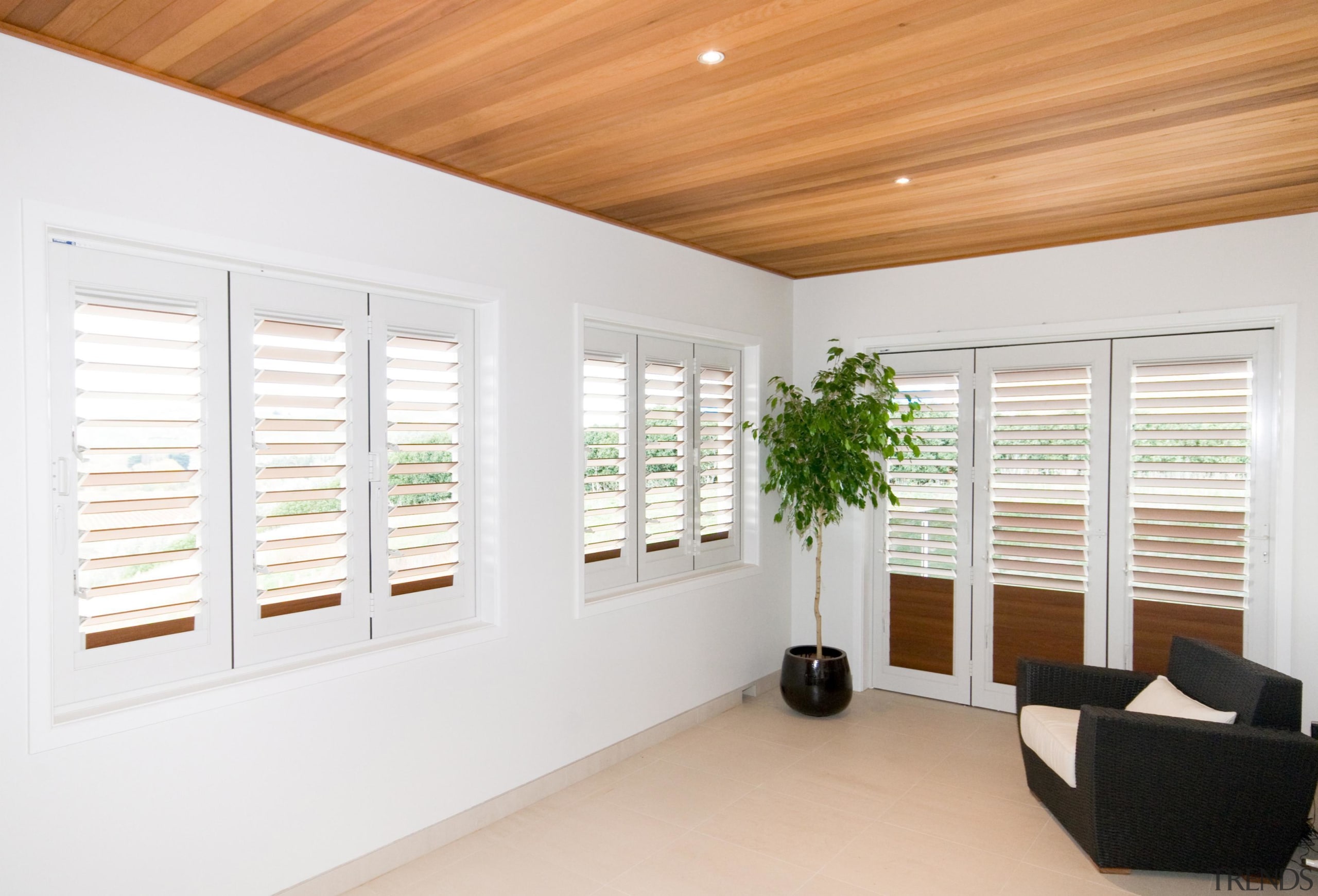 Bright upstairs deck with wooden and white colors daylighting, door, floor, home, interior design, real estate, window, window blind, window covering, window treatment, wood, white