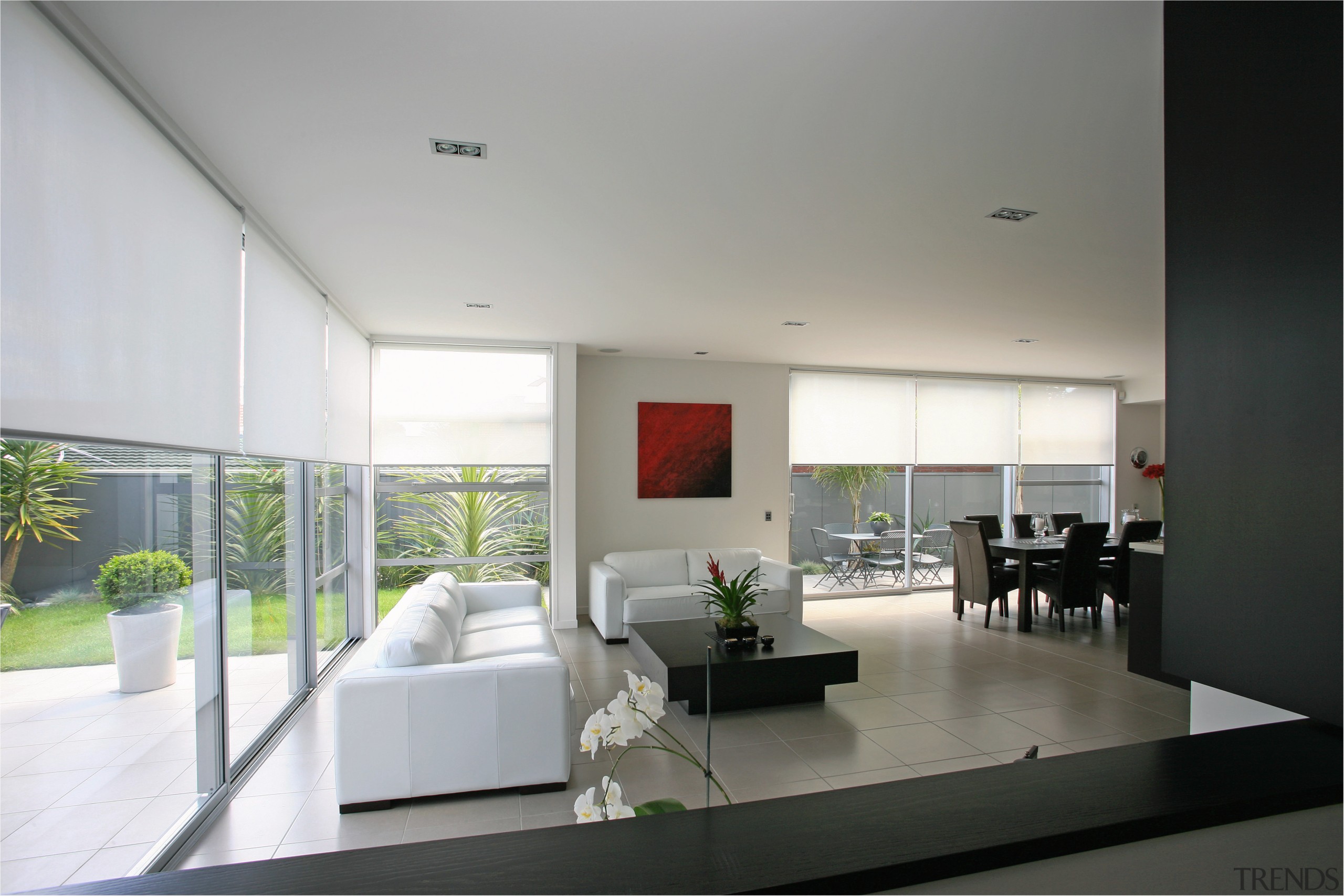 A view of these living areas featuring stained architecture, ceiling, house, interior design, living room, real estate, gray