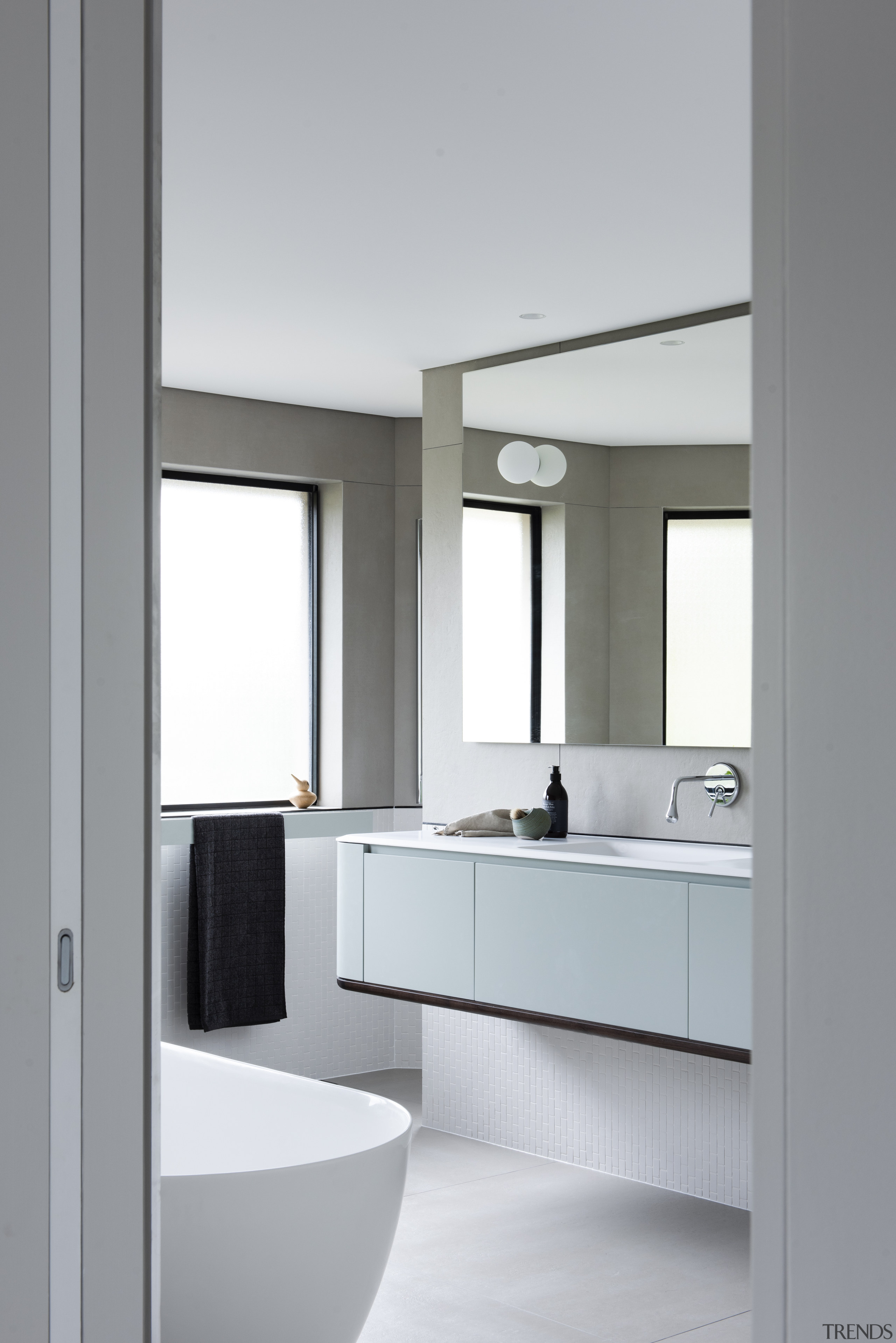 ​​​​​​​This master bathroom and dressing room renovation by gray