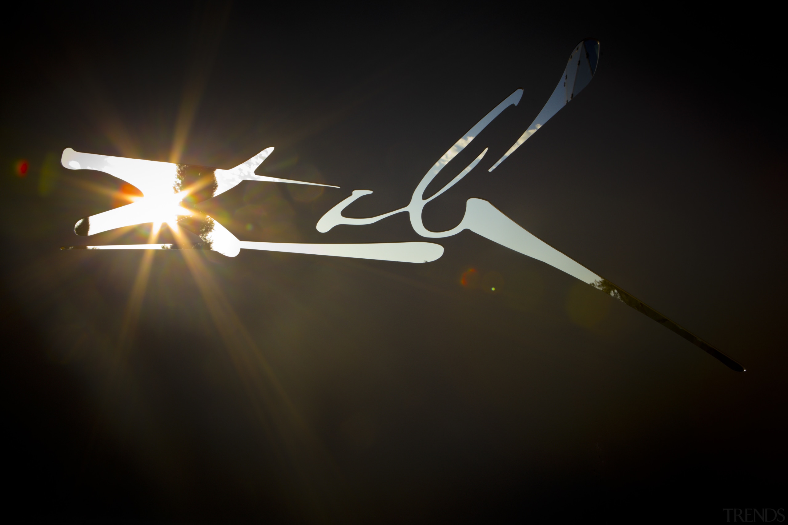 View of new art museum designed to house atmosphere, atmosphere of earth, darkness, light, lighting, line, night, sky, wing, black