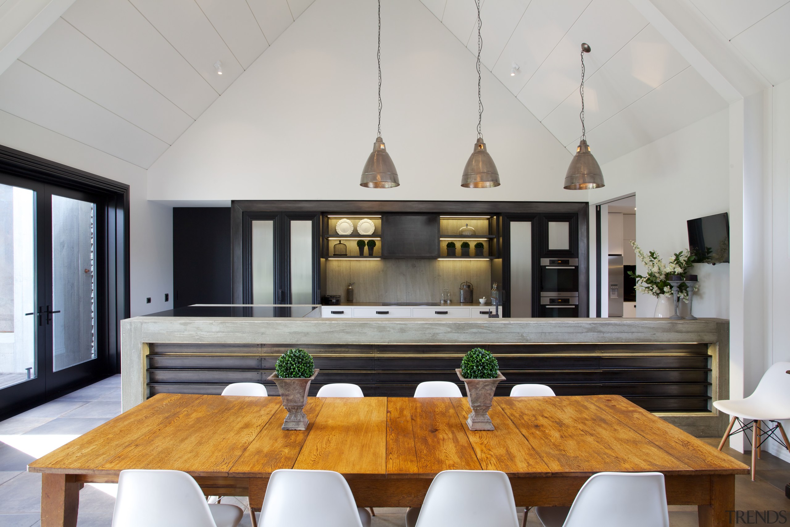 This kitchen has a sense of symmetry. However, ceiling, dining room, interior design, real estate, table, gray