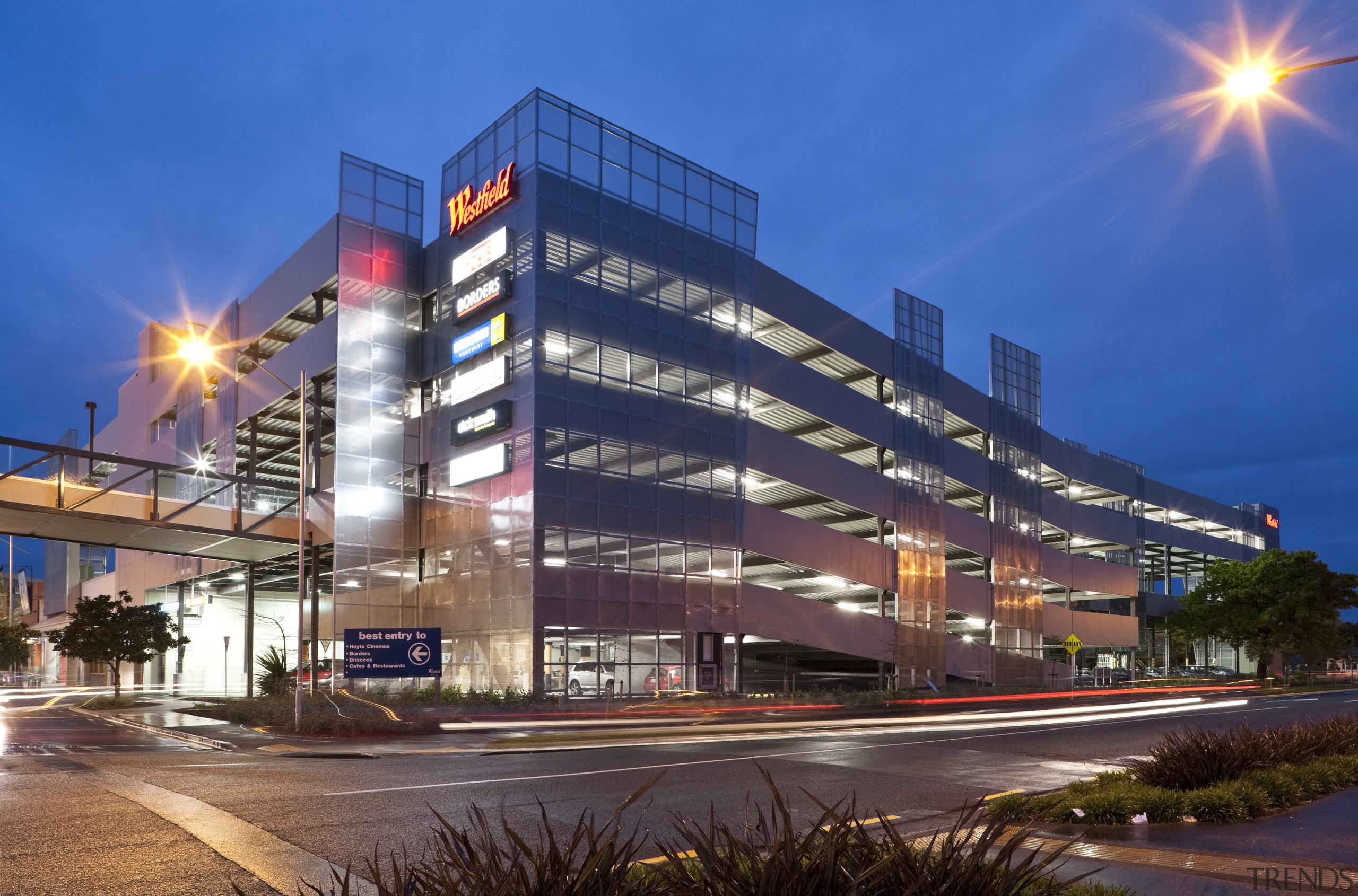 View of the Westfield Riccarton carpark. - View architecture, building, city, commercial building, condominium, corporate headquarters, headquarters, hotel, landmark, metropolis, metropolitan area, mixed use, night, real estate, residential area, sky, urban area, blue