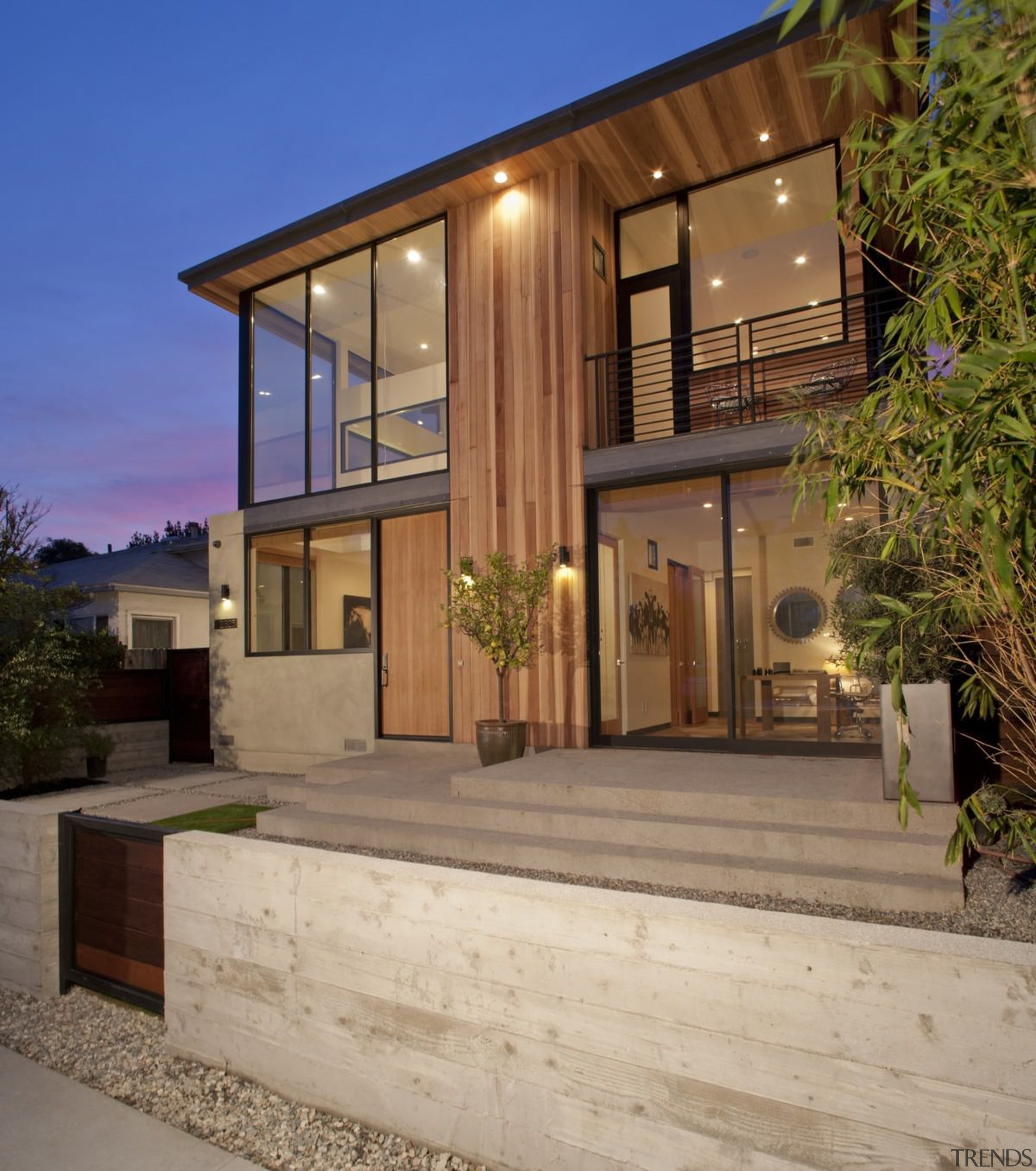 Wood and glass create an inviting facade - architecture, elevation, estate, facade, home, house, property, real estate, residential area, siding, window, brown