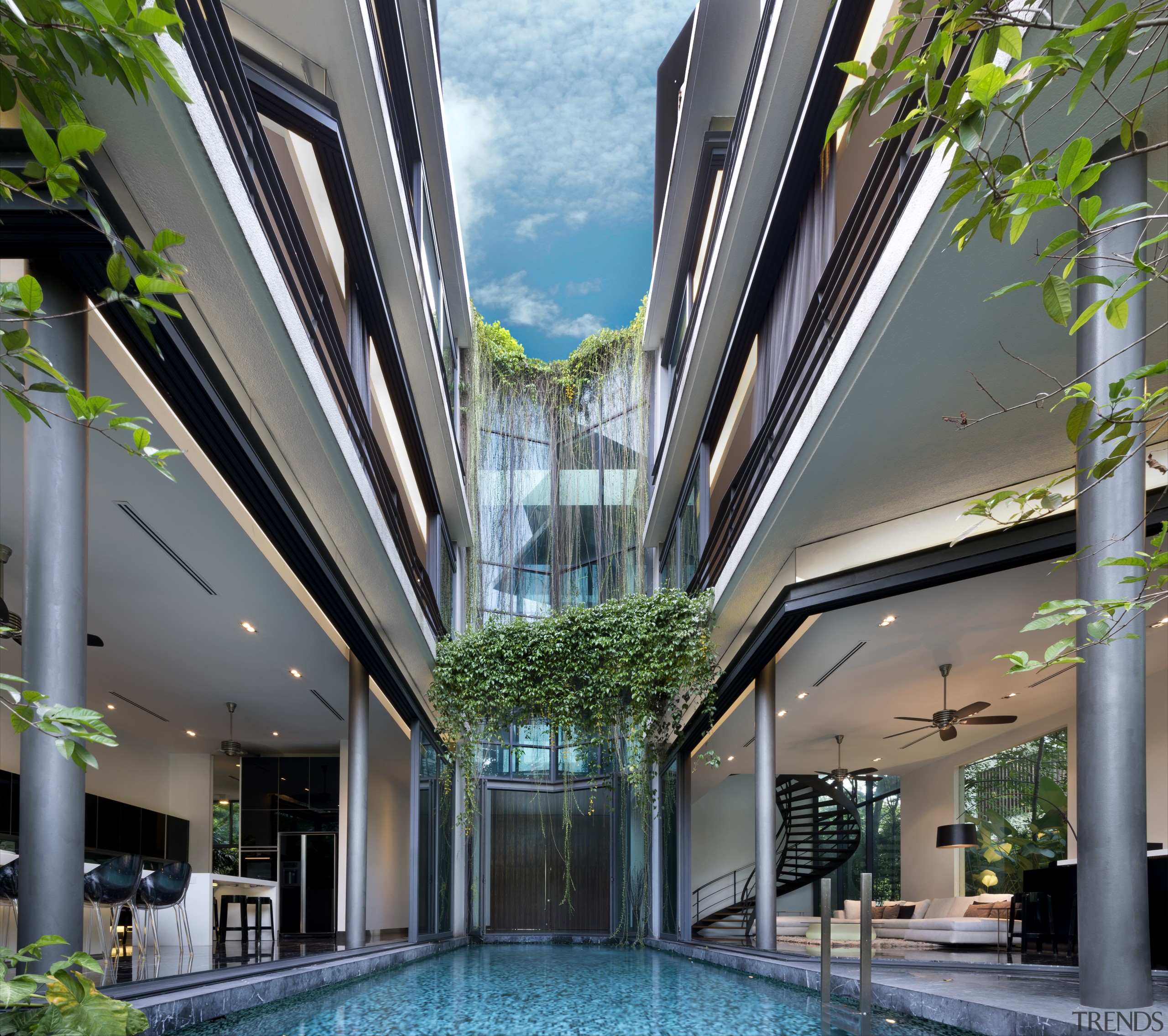 Glass bridges cross the atrium at the end apartment, architecture, condominium, daylighting, estate, home, house, mixed use, property, real estate, swimming pool, gray