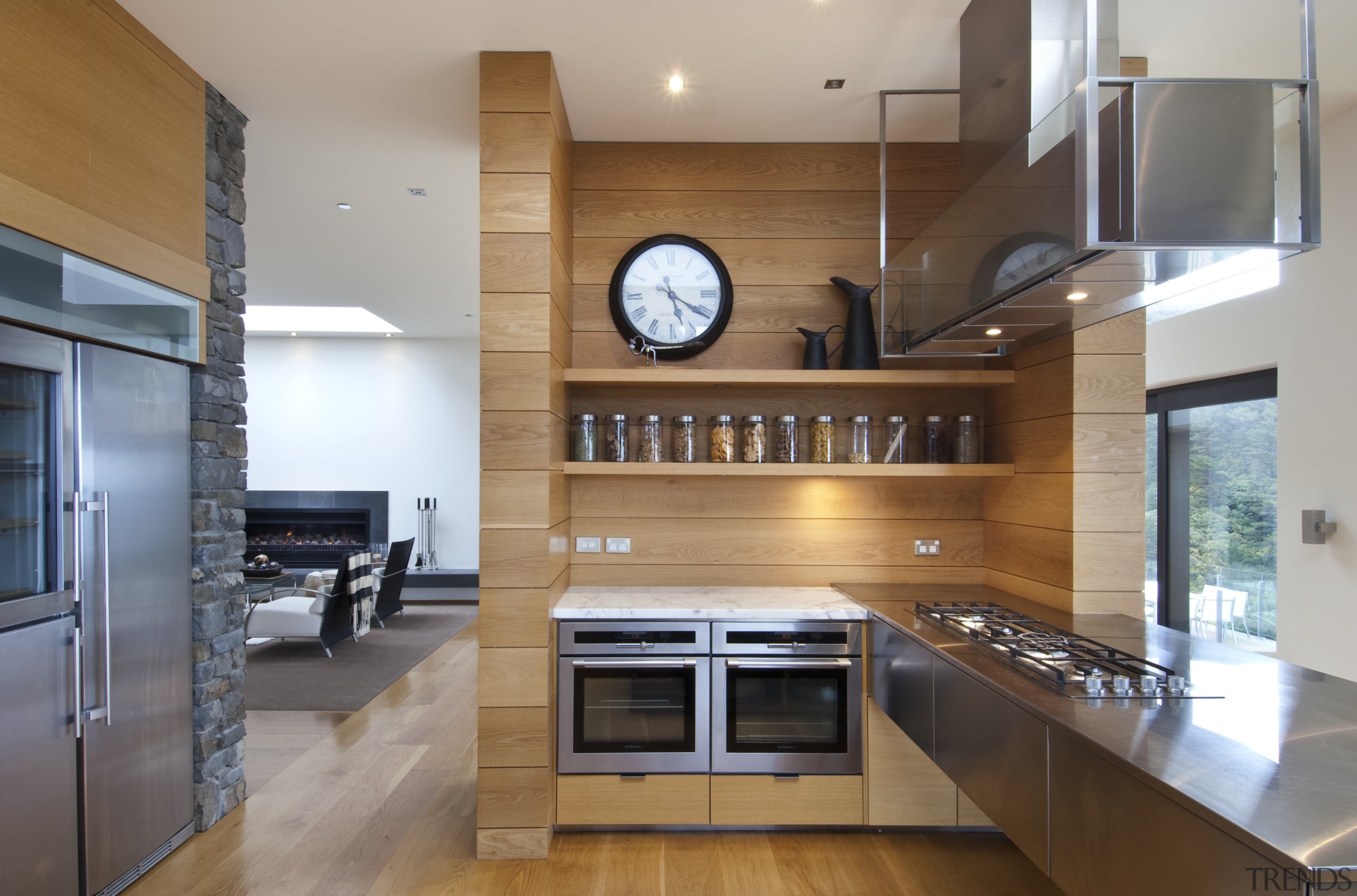 Raised floor kitchen. Stainless steel Binova cooktop. American cabinetry, countertop, cuisine classique, flooring, hardwood, interior design, kitchen, real estate, wood flooring, gray, brown