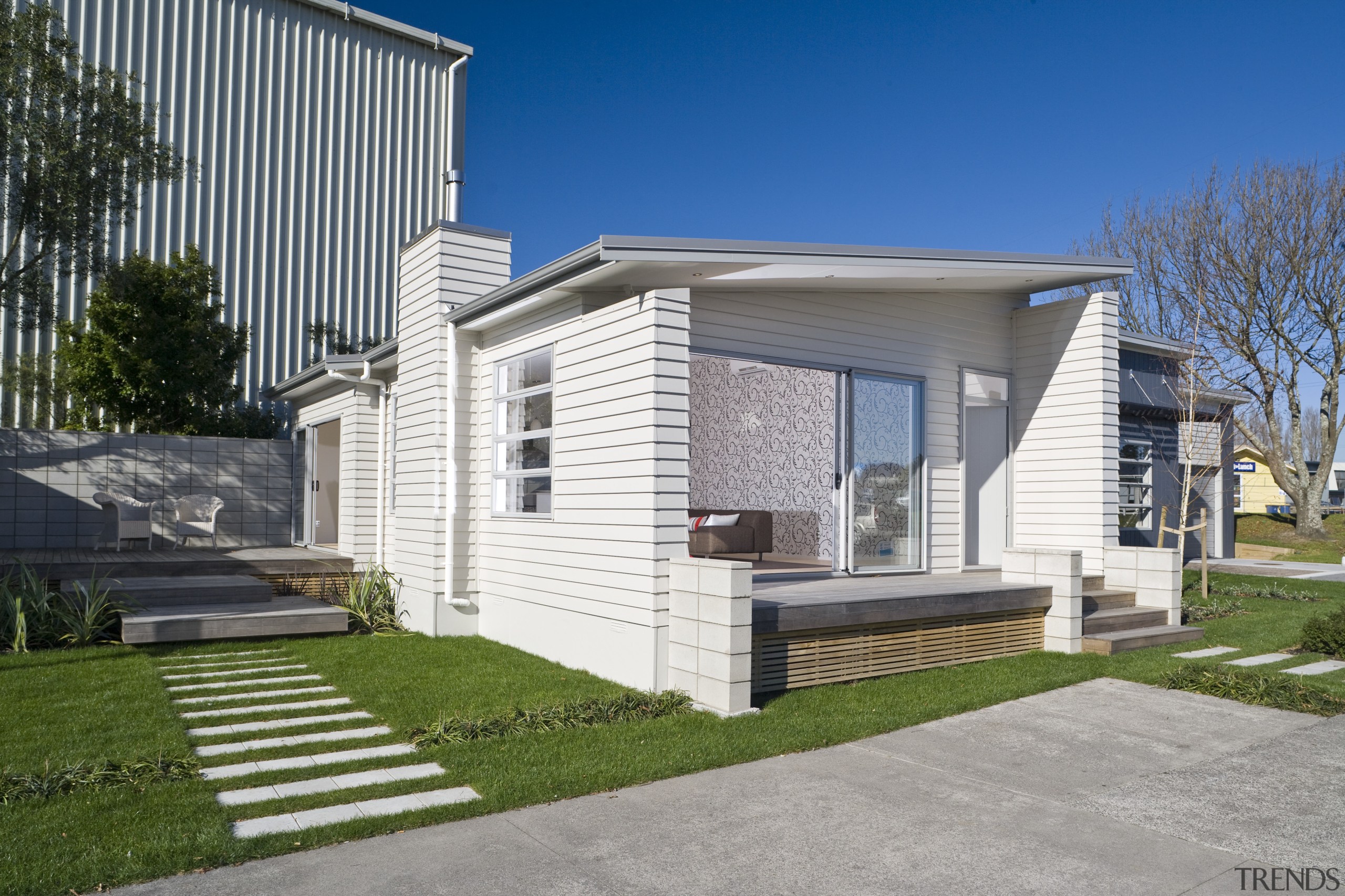 Exterior view of a Harmony Homes show home architecture, building, elevation, estate, facade, home, house, neighbourhood, property, real estate, residential area, siding, suburb, gray