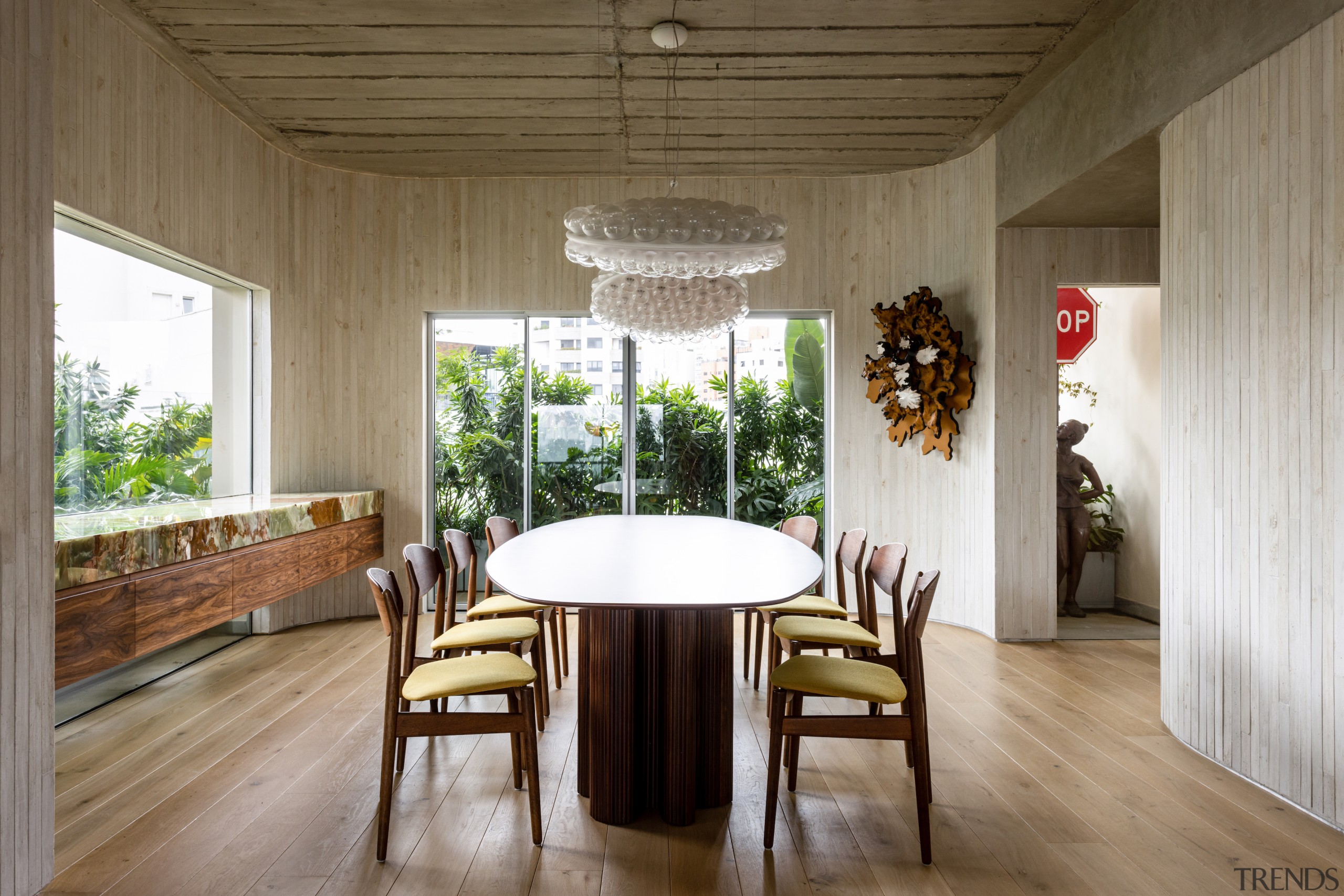 The dining room features vintage Erik Buch chairs, 