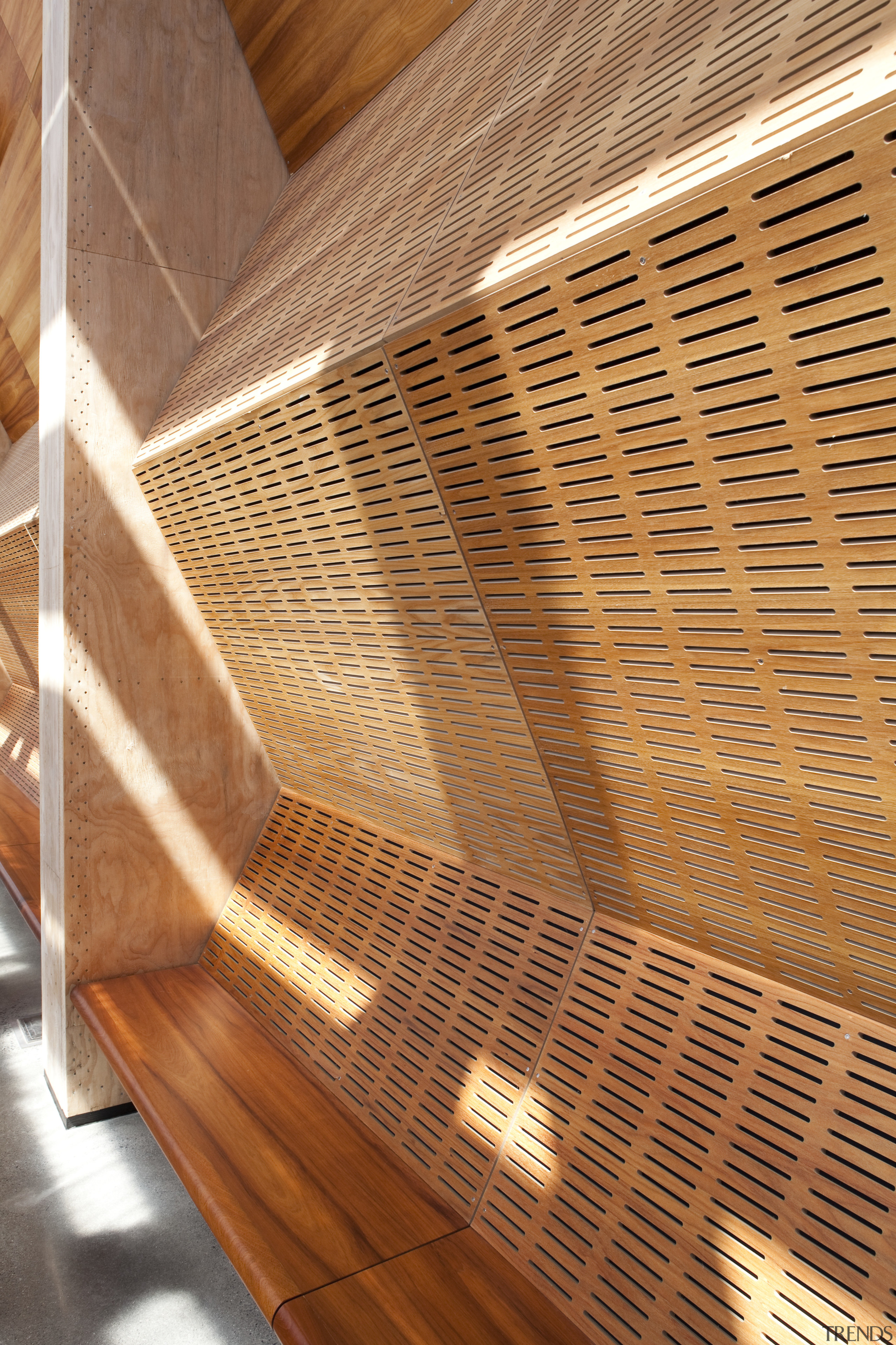 The acoustic timber panelling seen here in this architecture, ceiling, daylighting, interior design, light, lighting, line, material, wood, wood stain, orange, brown