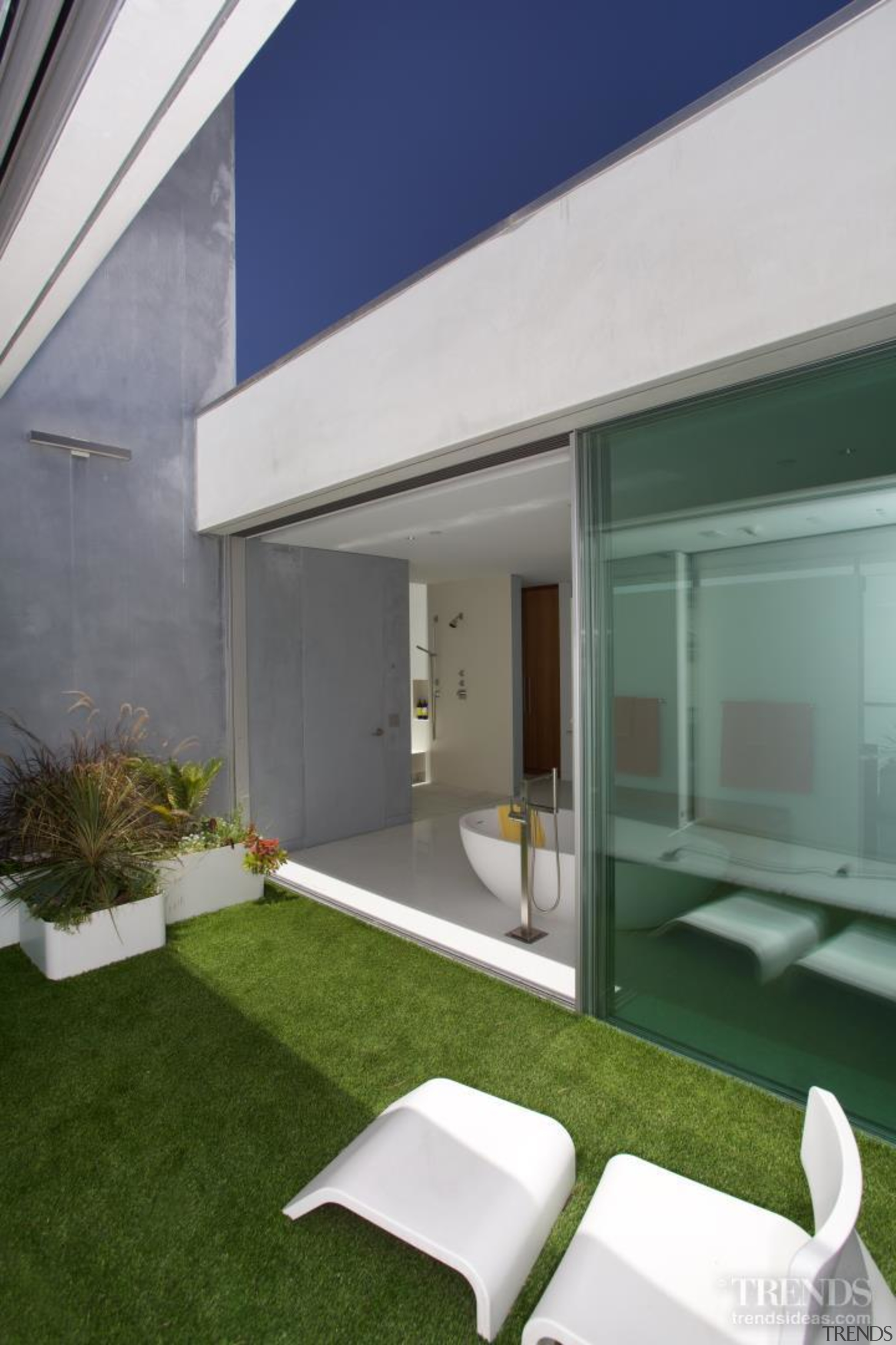 This master suite, on the top level of architecture, daylighting, facade, home, house, interior design, real estate, roof, window, gray
