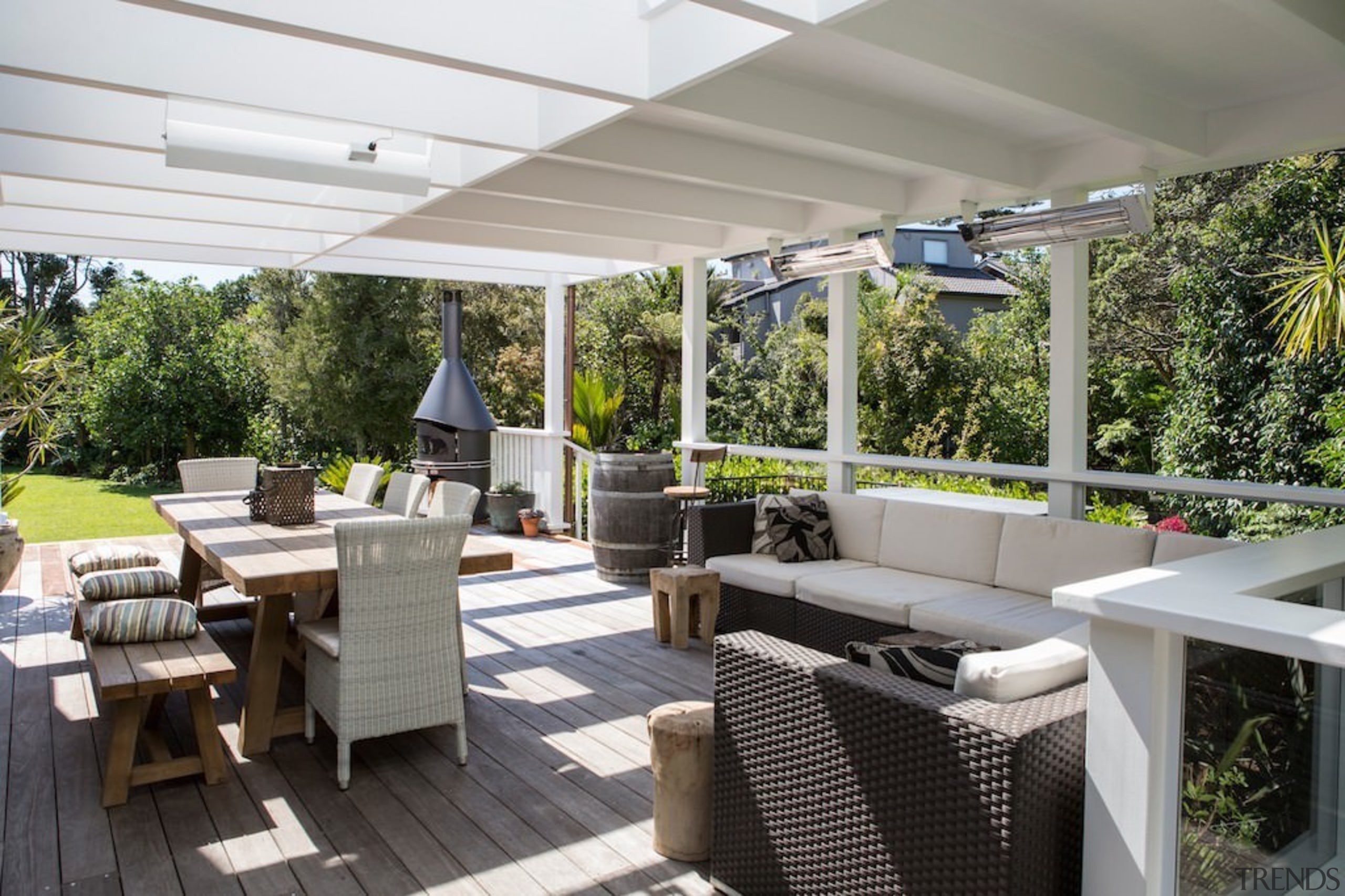This outdoor space gives a feeling of living interior design, outdoor structure, patio, property, real estate, roof, gray