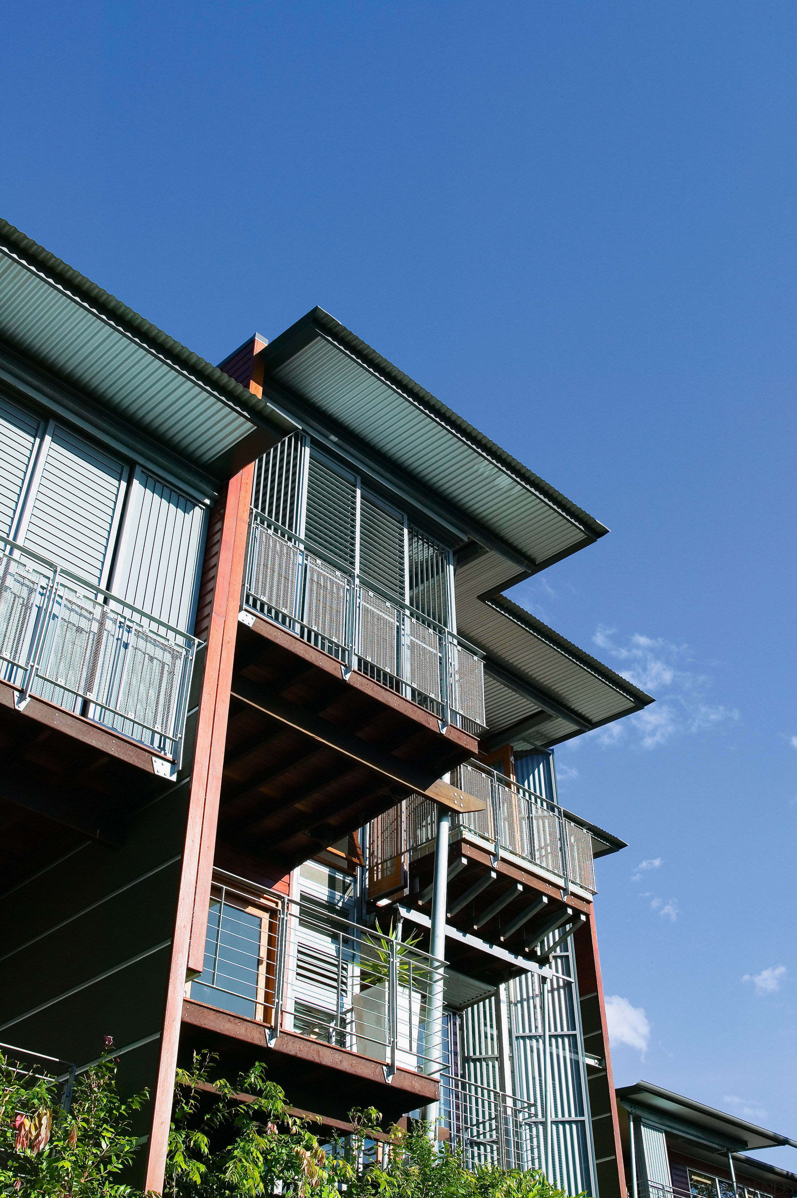 view of the  Zincalume underside finish,  apartment, architecture, building, condominium, facade, home, house, real estate, residential area, sky, window, wood, blue, black