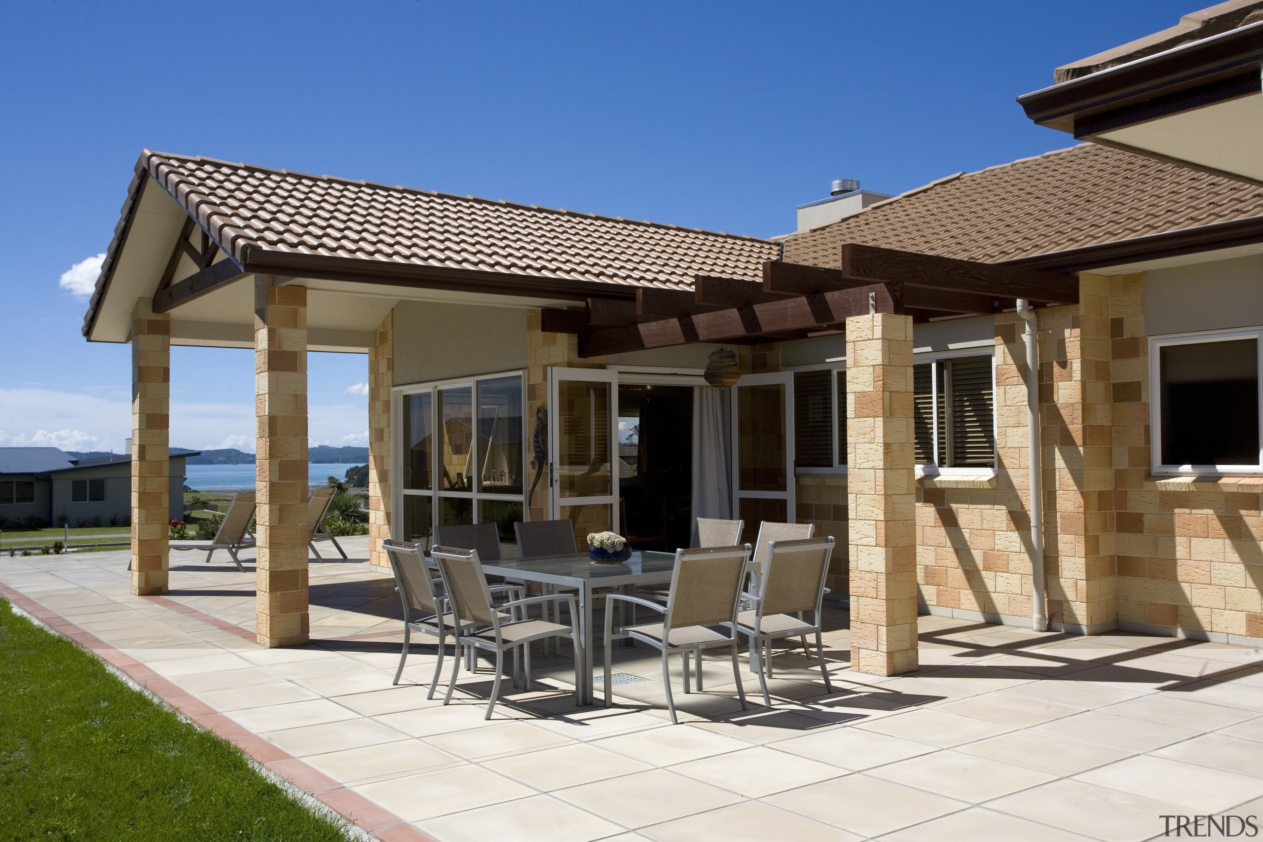 Exterior view of contemporary house with living room house, outdoor structure, patio, pergola, property, real estate