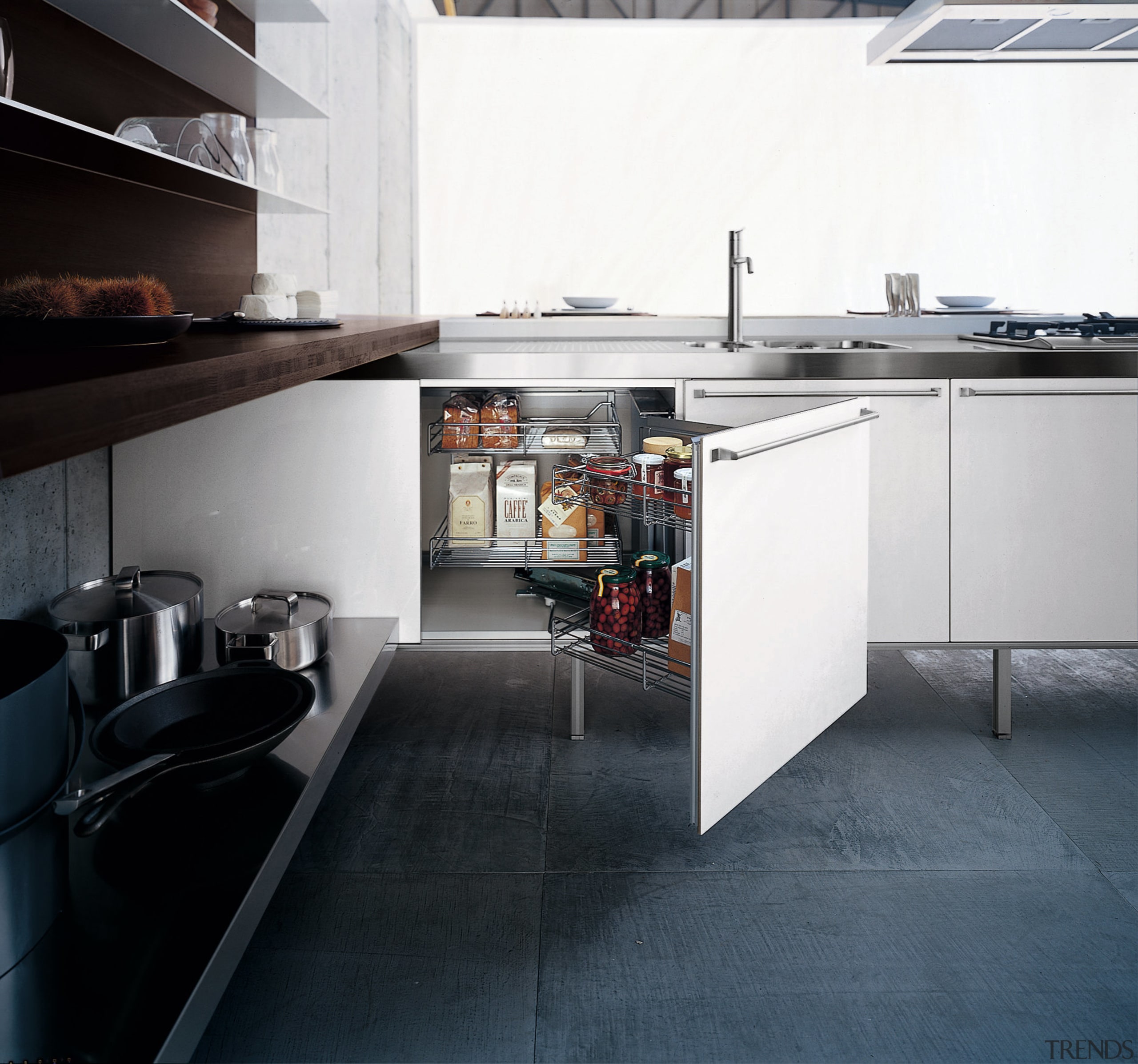 View of the cabinetry of this kitchen - countertop, floor, flooring, interior design, kitchen, white, black