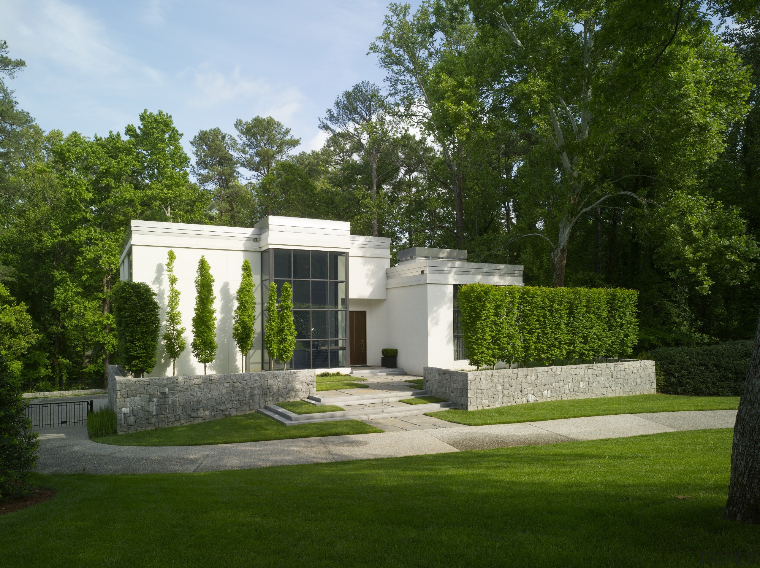 View of white home. - View of white architecture, estate, facade, garden, grass, home, house, landscape, lawn, mansion, property, real estate, yard, green