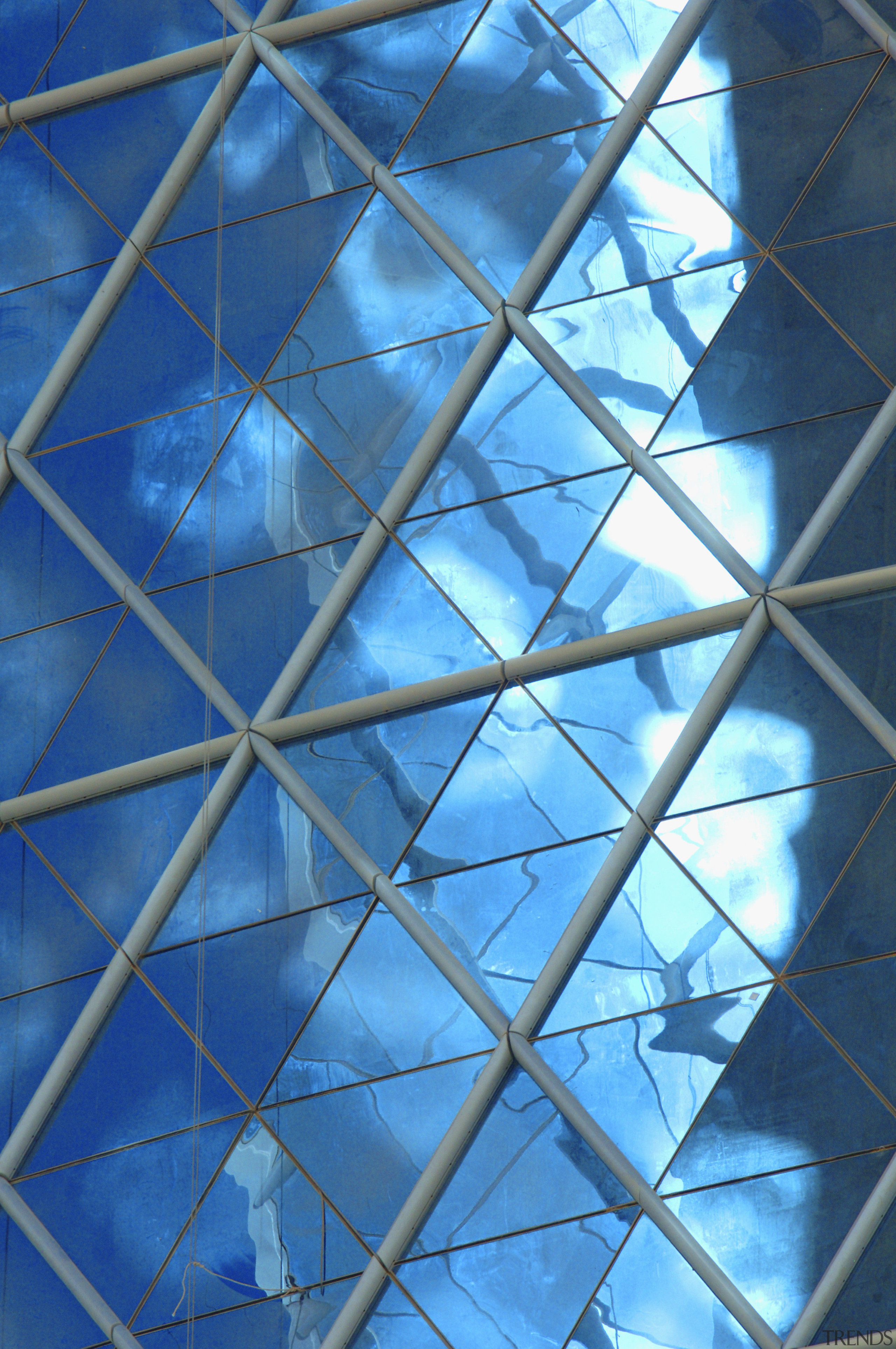 The Bahrain World Centre has a unique shape architecture, azure, blue, daylighting, daytime, line, pattern, sky, structure, symmetry, triangle, teal, blue