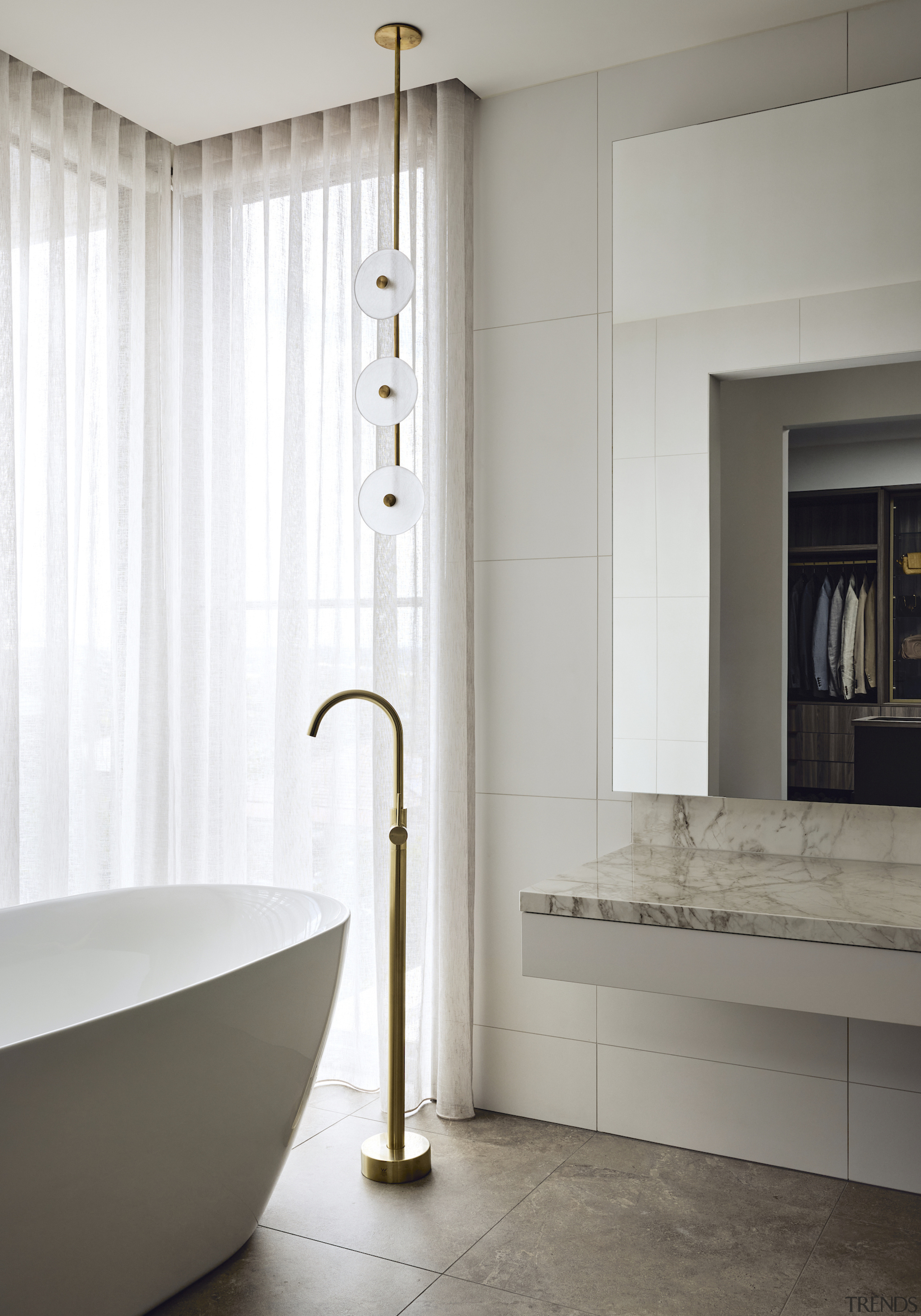 Floor-standing tub pourer reaches up – almost to 