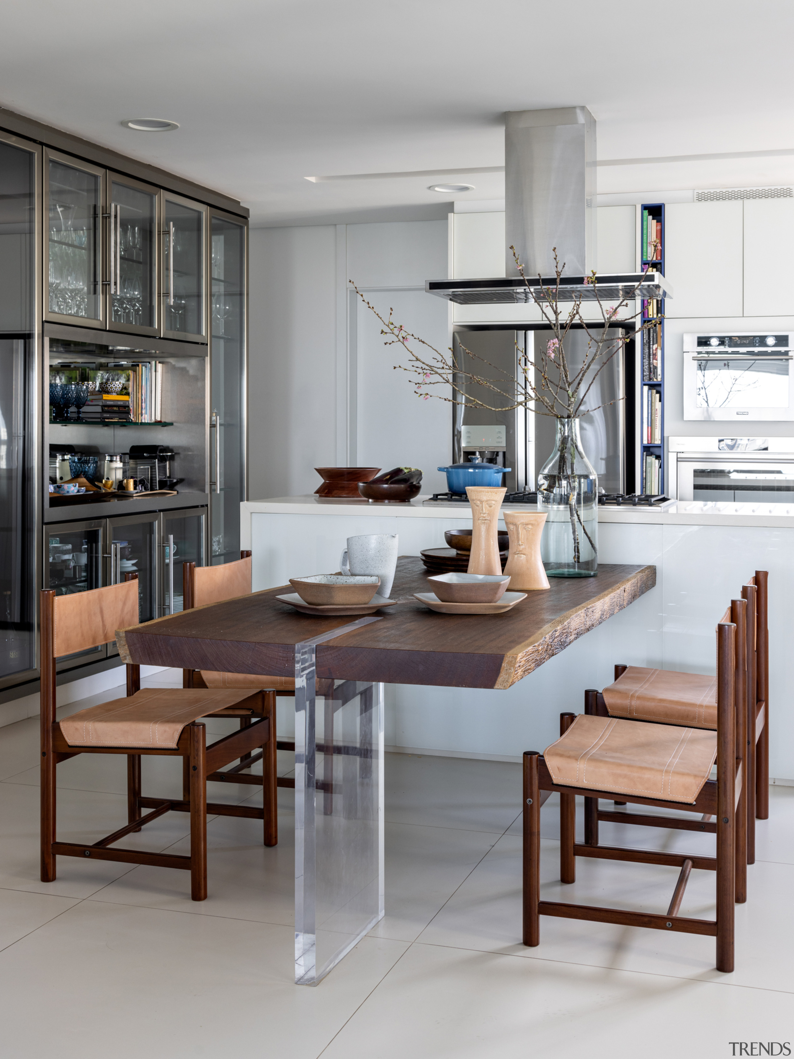 Stainless steel appliances complement the contemporary cabinetry. 