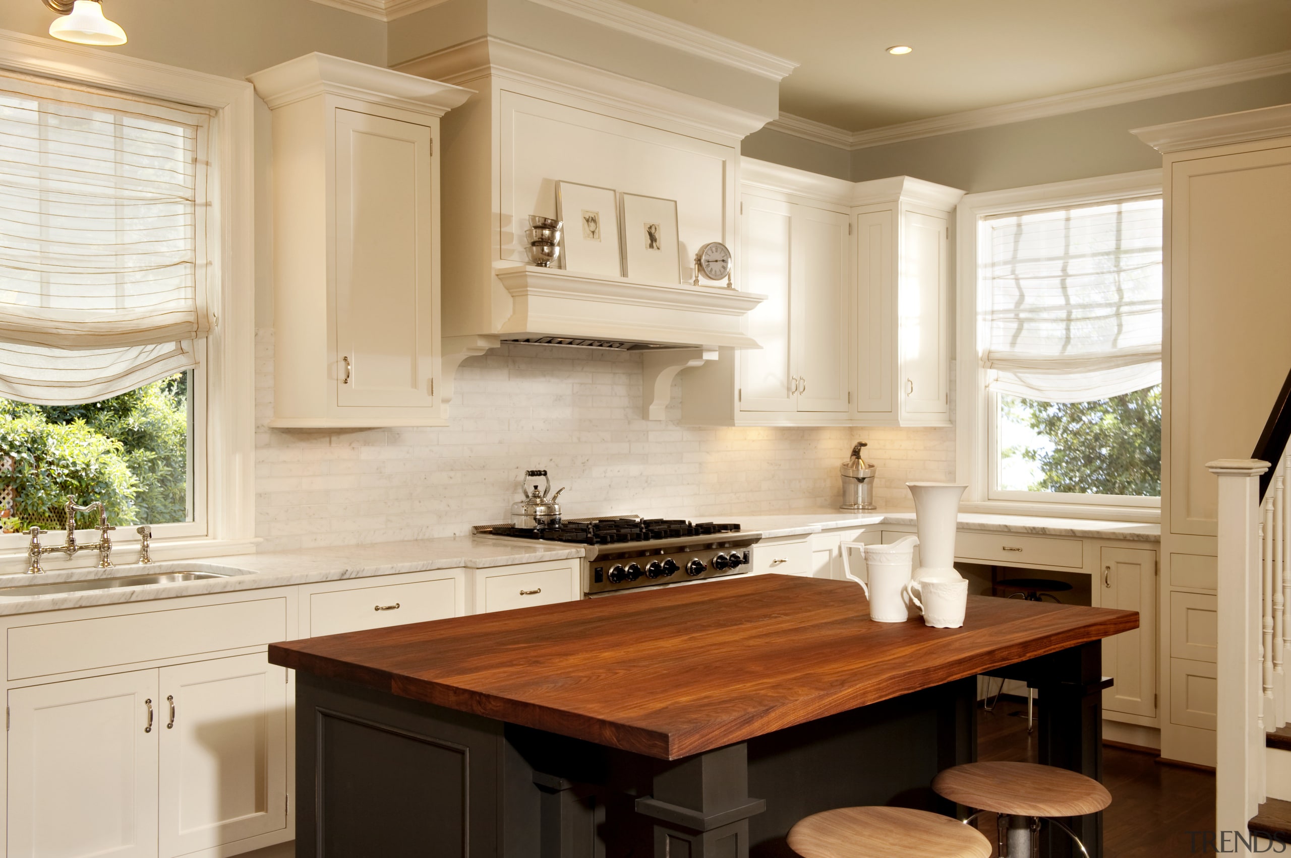 View of kitchen designed by Nadia Subaran. Designed cabinetry, countertop, cuisine classique, home, interior design, kitchen, room, window, orange