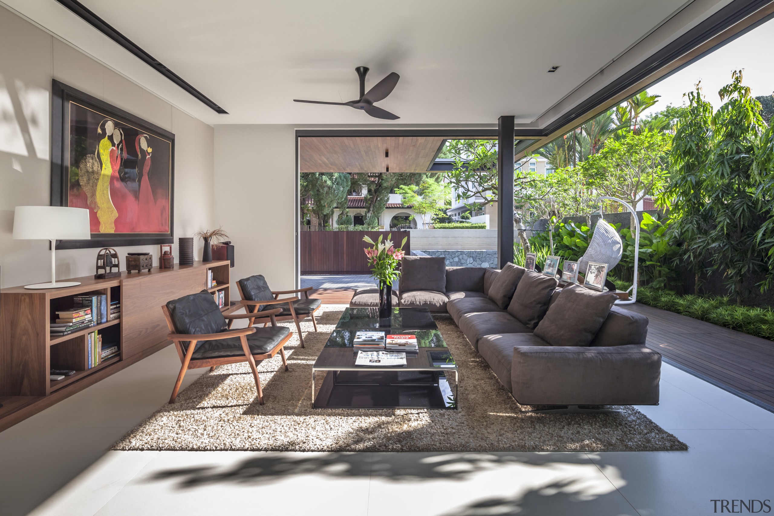 The ground-floor living room of this house designed home, house, interior design, living room, real estate, room, gray