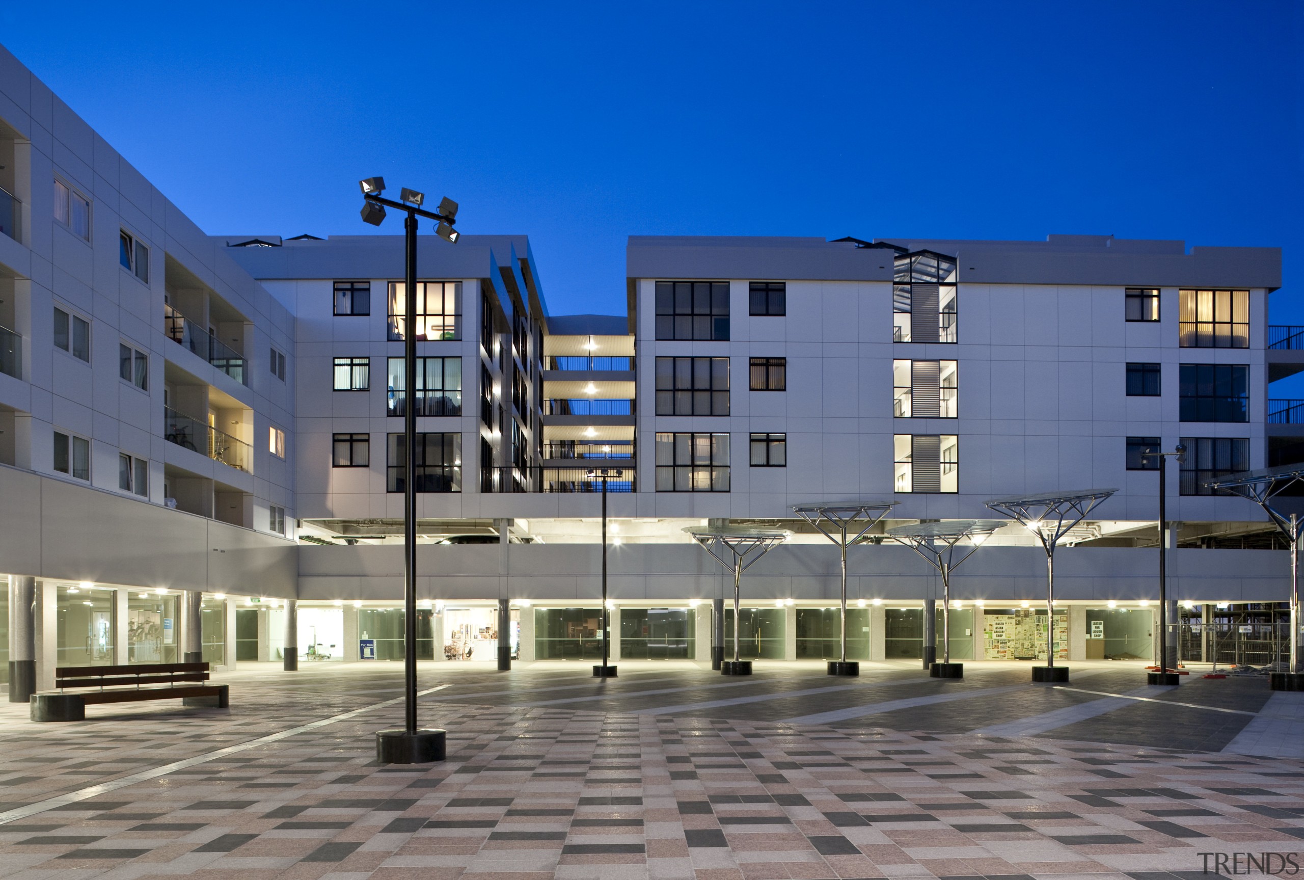 Exterior view of kings square and queens lodge apartment, architecture, building, city, commercial building, condominium, corporate headquarters, facade, headquarters, home, hotel, metropolitan area, mixed use, neighbourhood, real estate, residential area, sky, window, blue, gray