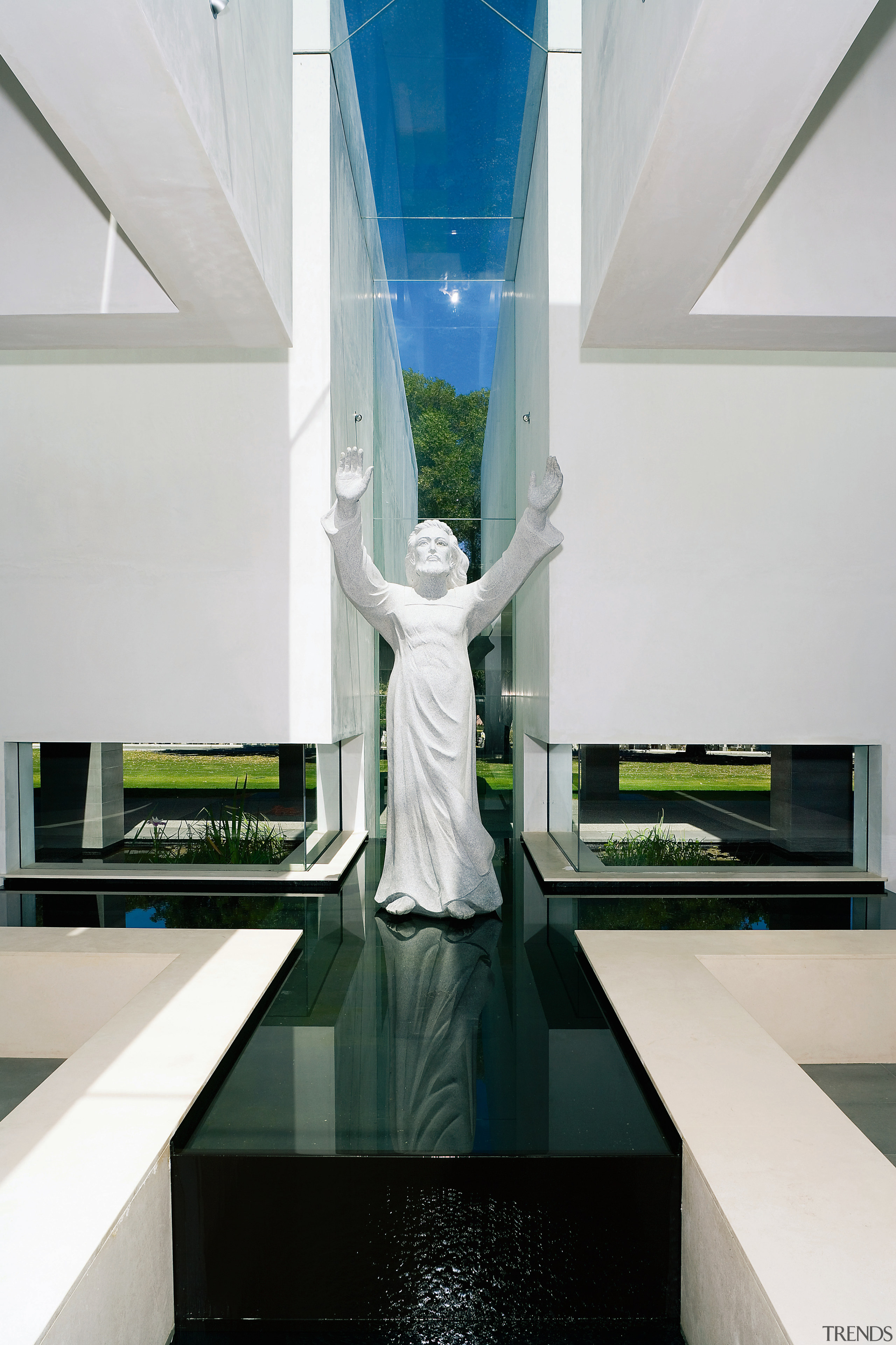 view of the statute of jesus with sunlight architecture, glass, interior design, product design, white