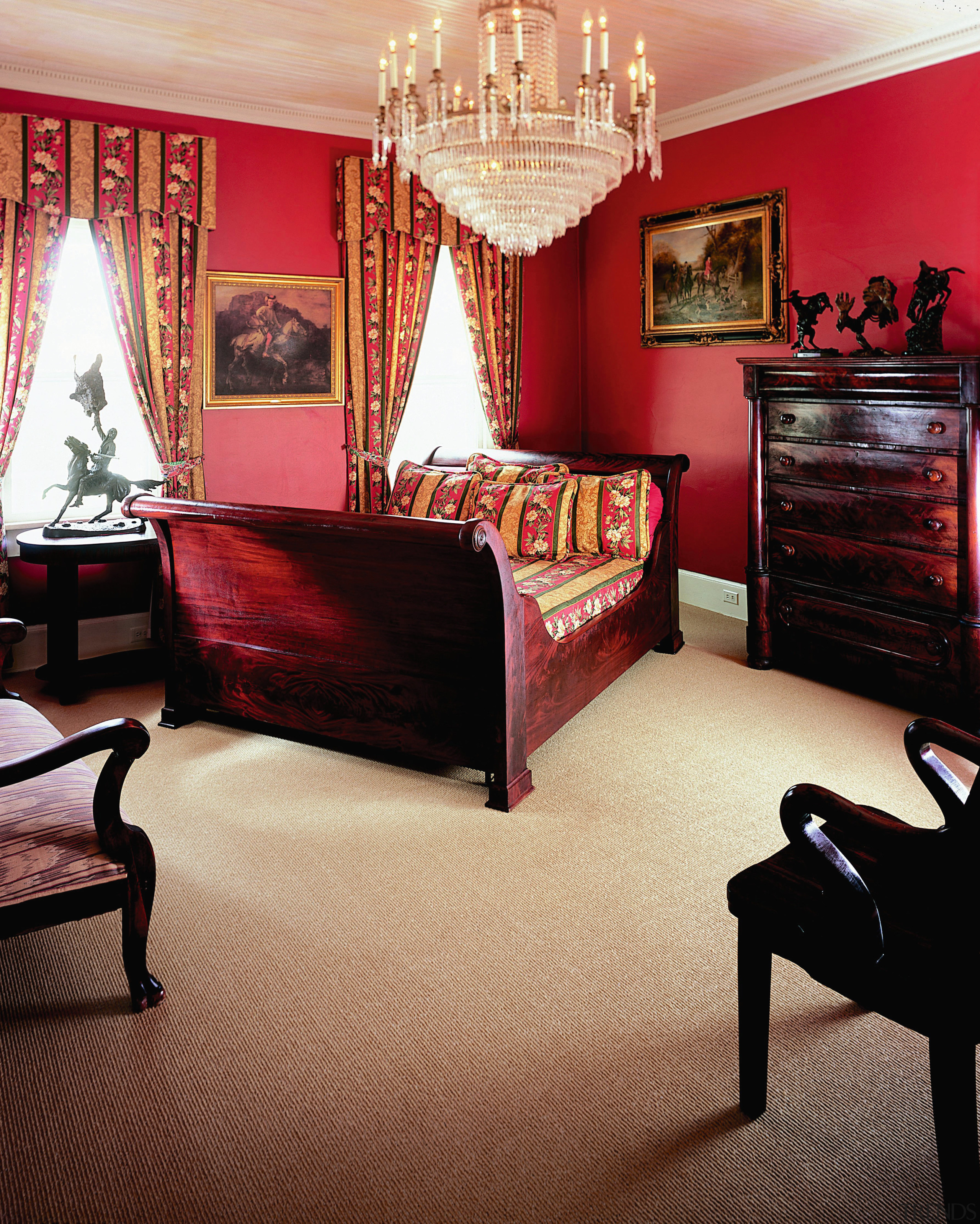 View of bedroom with red walls, red toned bed, bed frame, bedroom, ceiling, floor, flooring, furniture, hardwood, home, interior design, laminate flooring, living room, room, suite, table, wall, window, wood, wood flooring, orange