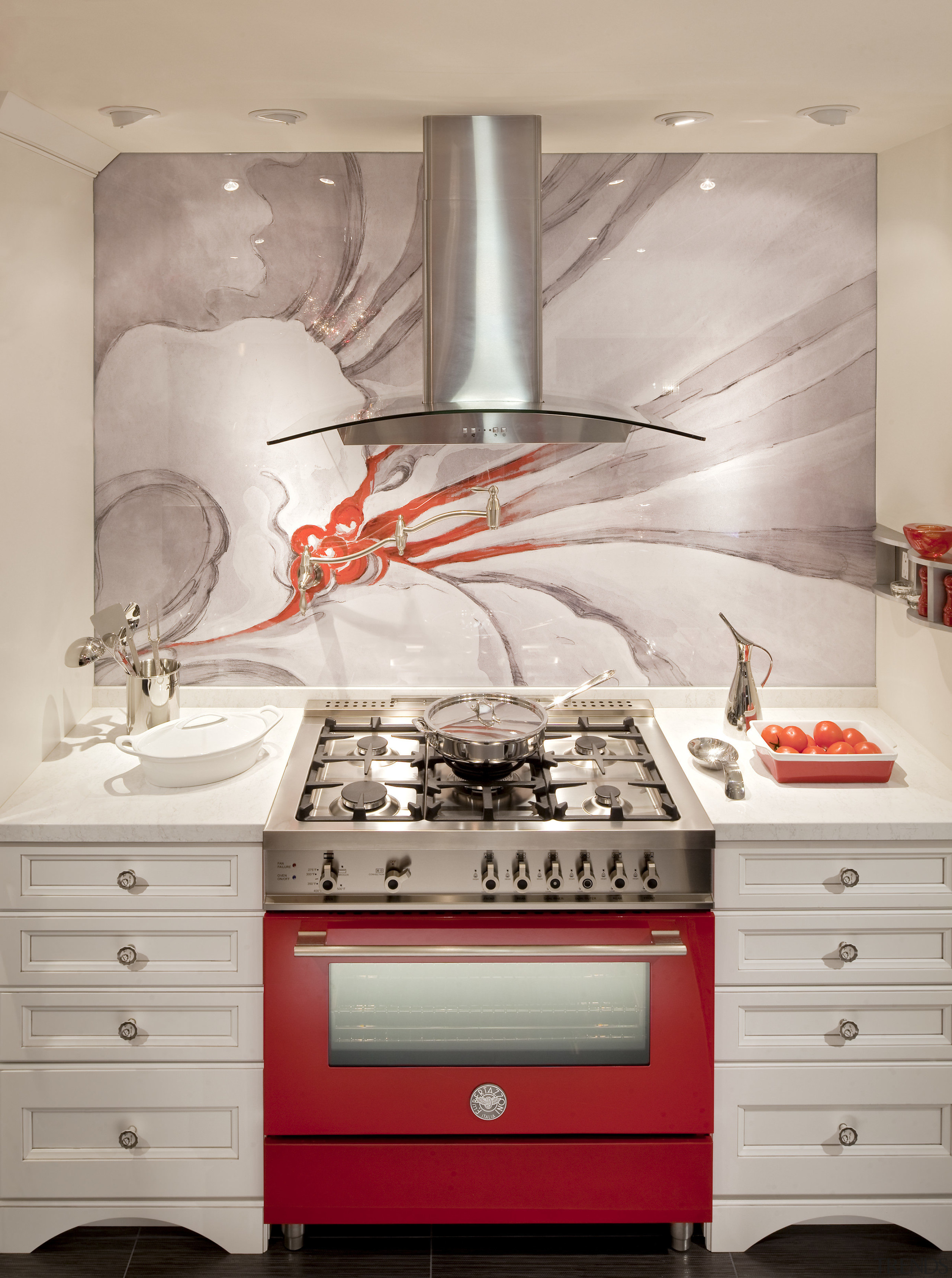A bright red Bertazzoni range is a colourful countertop, home appliance, interior design, kitchen, kitchen appliance, kitchen stove, room, wall, gray