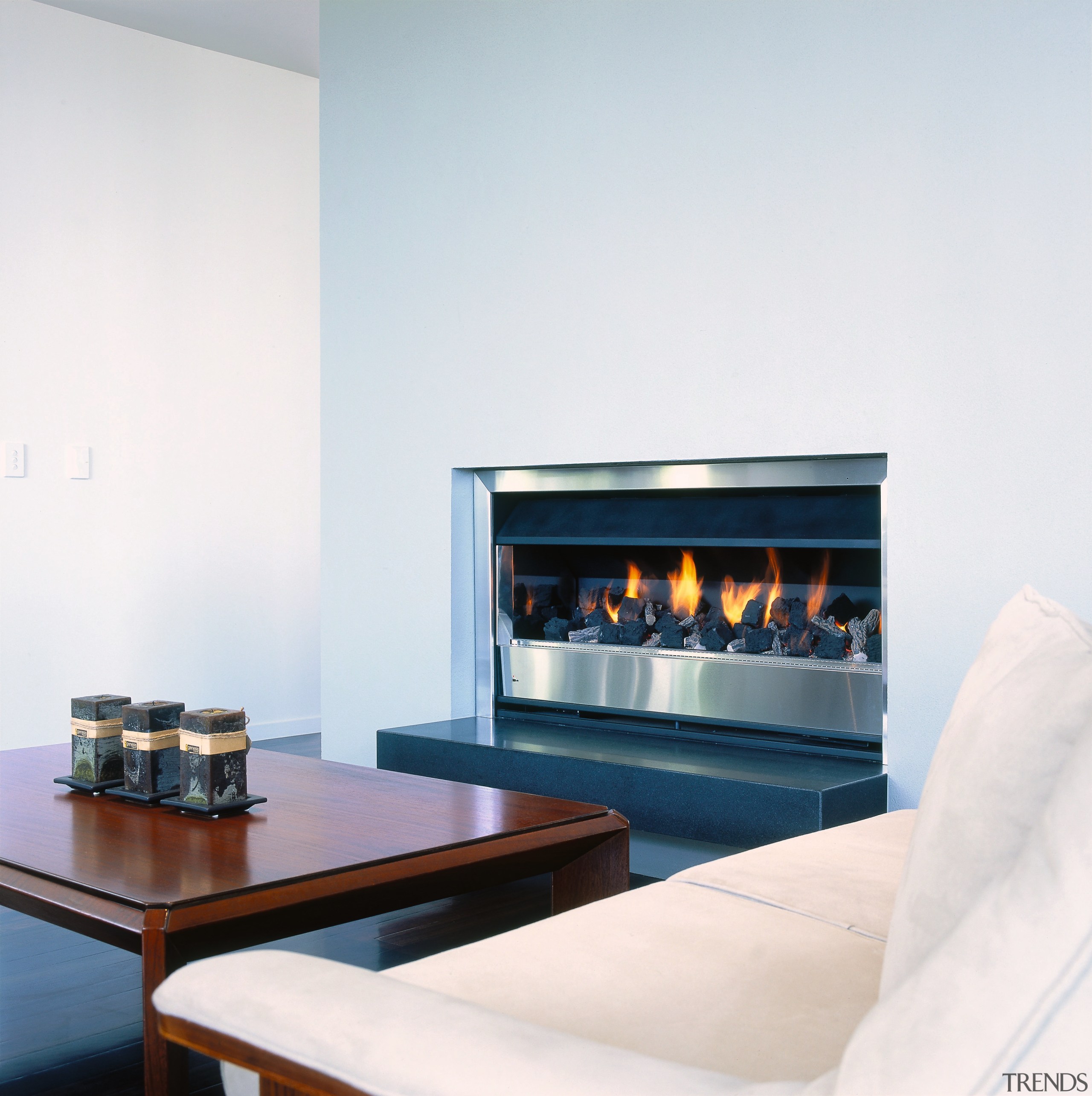 View of a lounge area, wooden flooring, fireplace, fireplace, hearth, interior design, living room, white