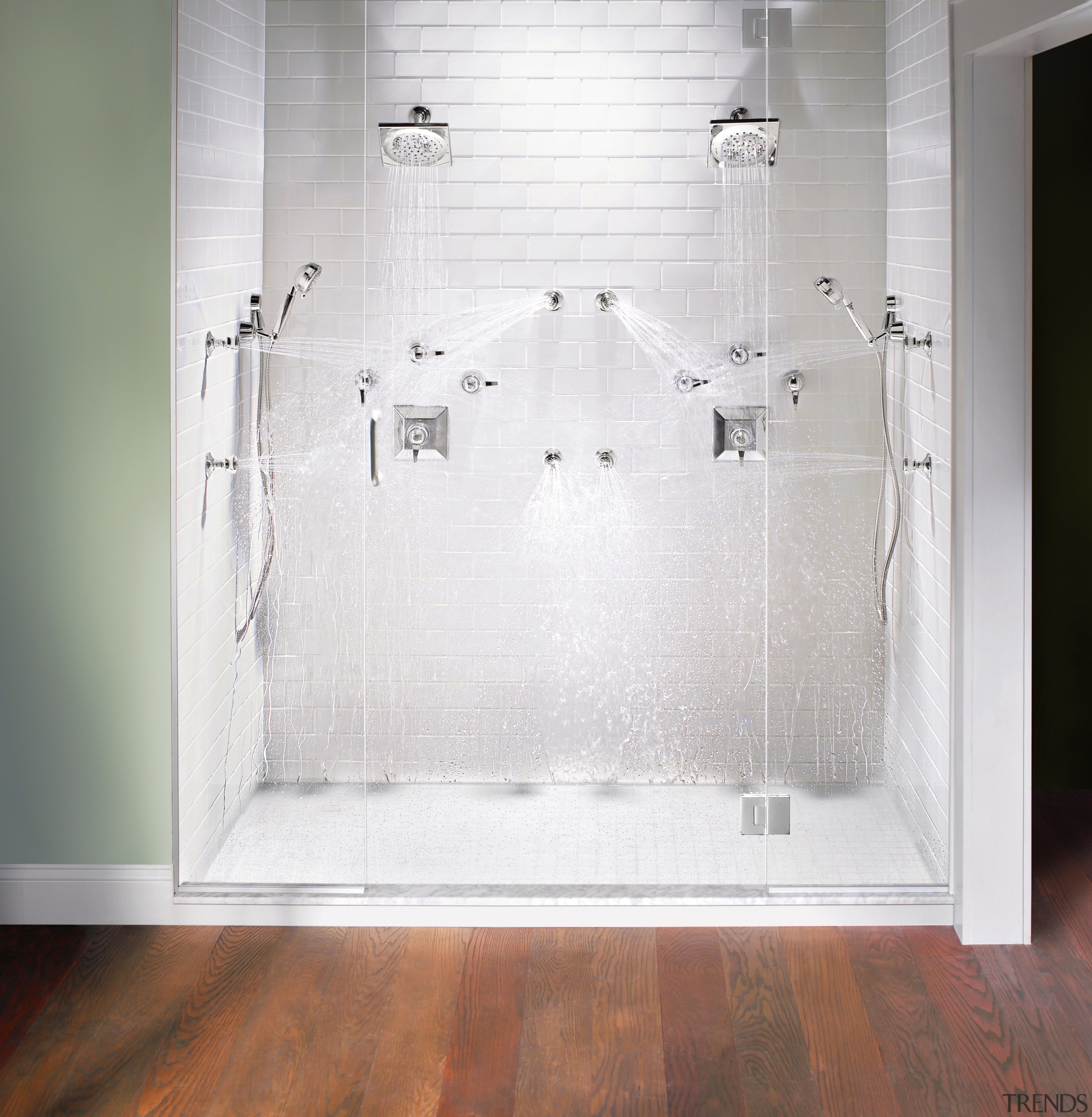 view of shower enclosure which features the showerheads bathroom, floor, flooring, glass, interior design, plumbing fixture, room, shower, shower door, tile, wall, white