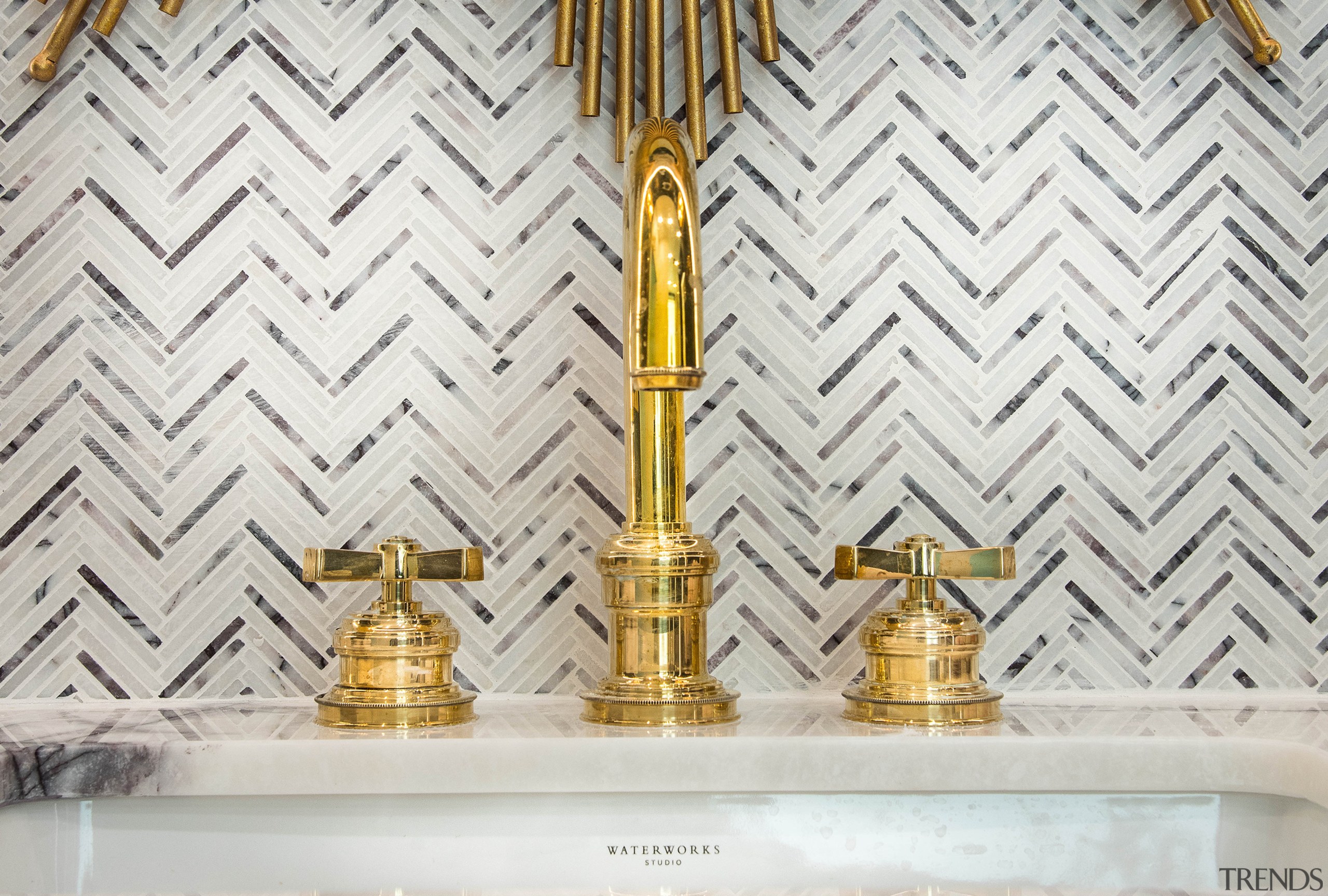 Lilac marble tile was repeated from the floor 