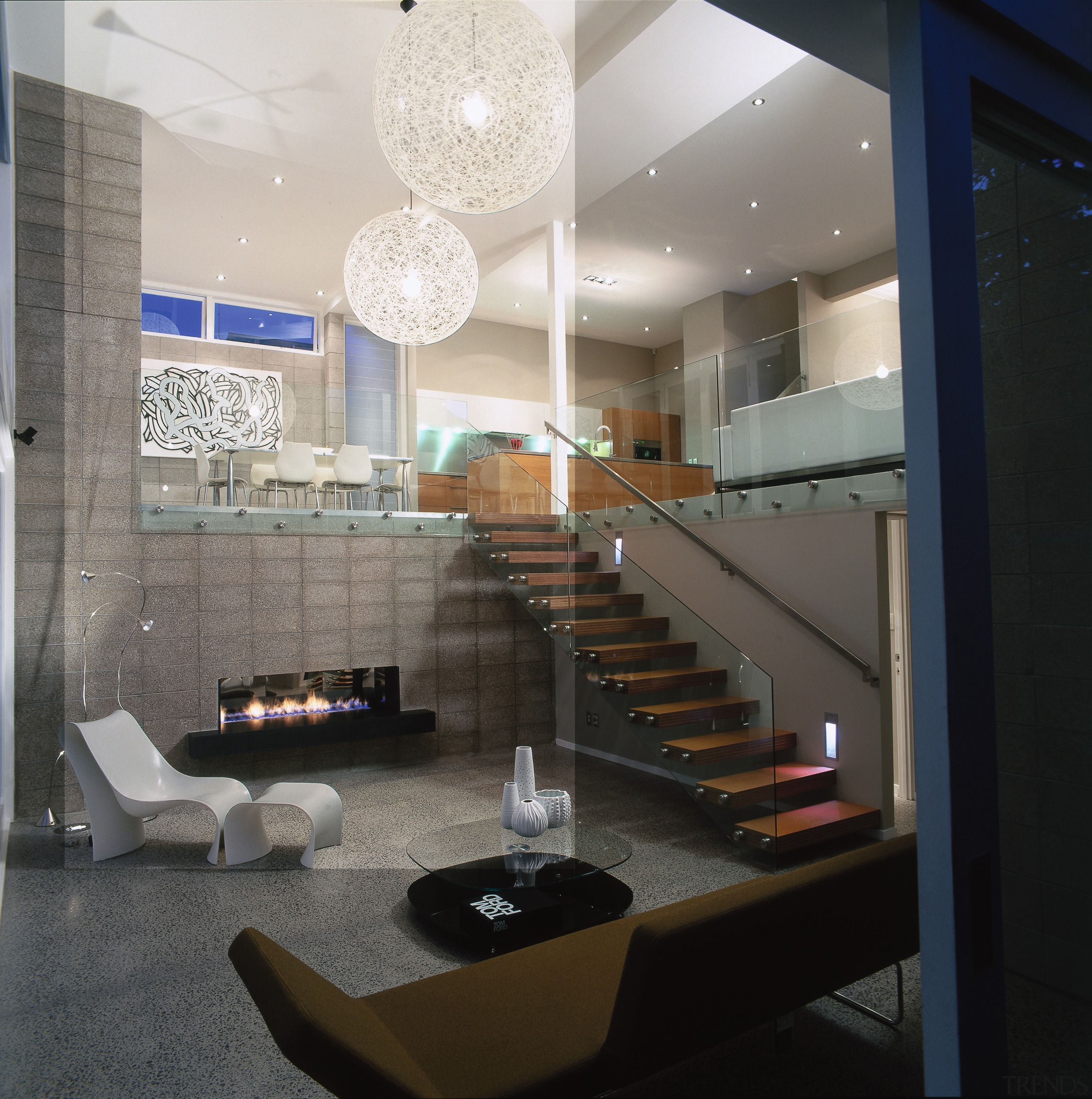 view of the living area featuring  polished architecture, ceiling, interior design, lobby, black, gray