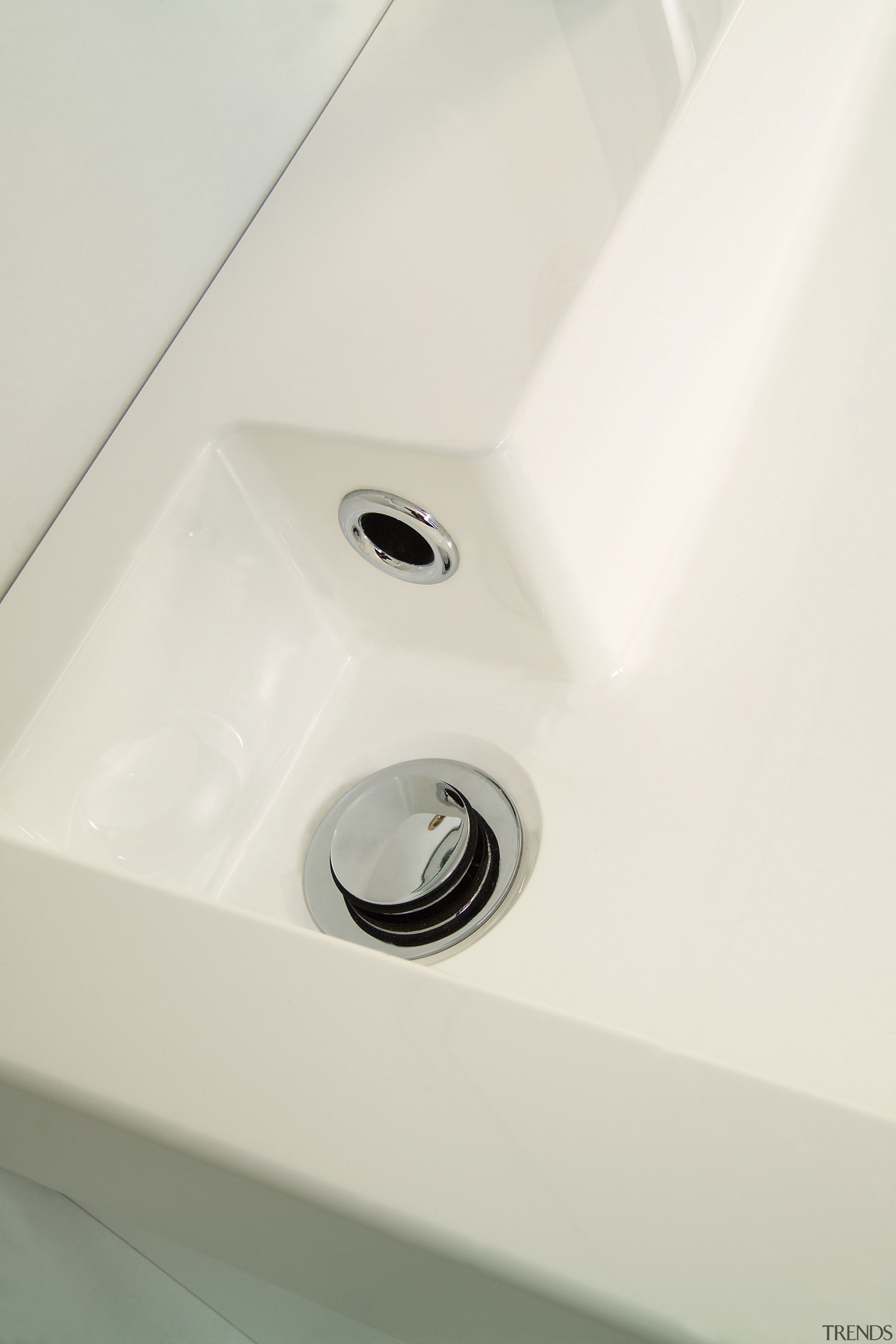 View of this bathroom featuring white cabinetry, stainless angle, bathroom sink, hardware, plumbing fixture, product design, sink, tap, white