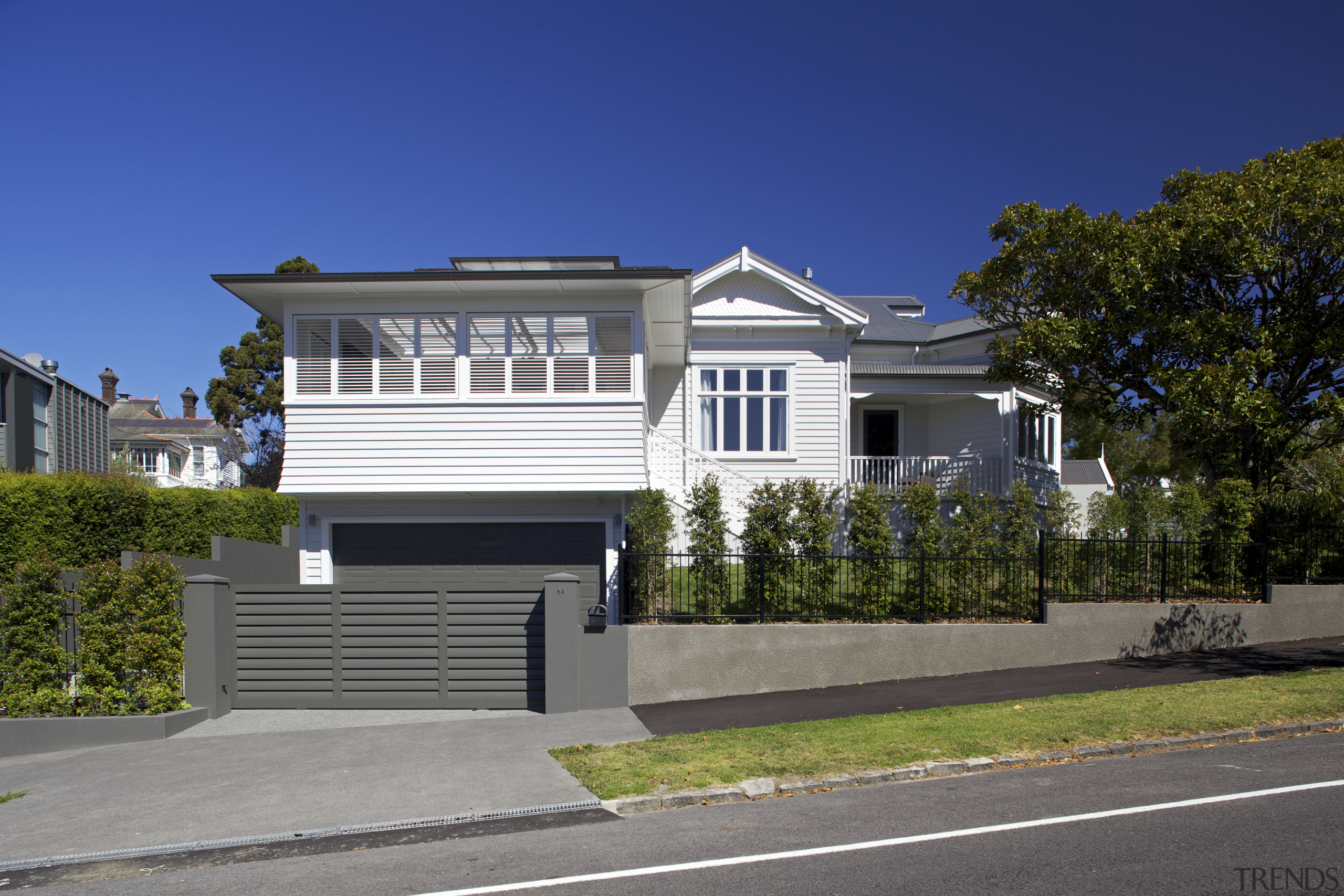 A new covered alfresco living area is positioned architecture, building, cottage, elevation, estate, facade, home, house, neighbourhood, property, real estate, residential area, sky, suburb, villa, blue, gray